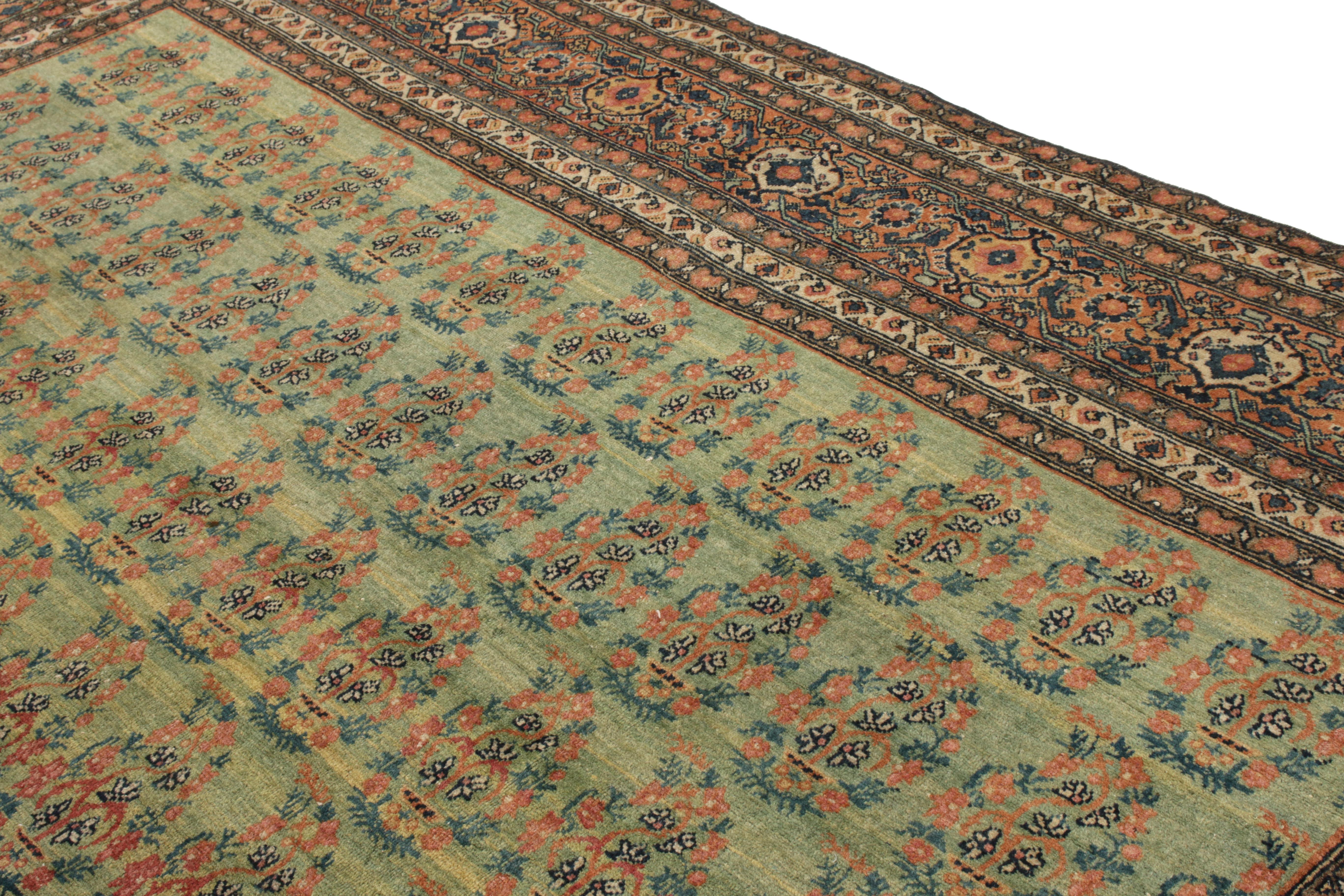 Antique Tabriz Persian Rug in an All over Green, Red Floral Pattern In Good Condition For Sale In Long Island City, NY