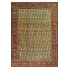Antique Tabriz Persian Rug in an All over Green, Red Floral Pattern