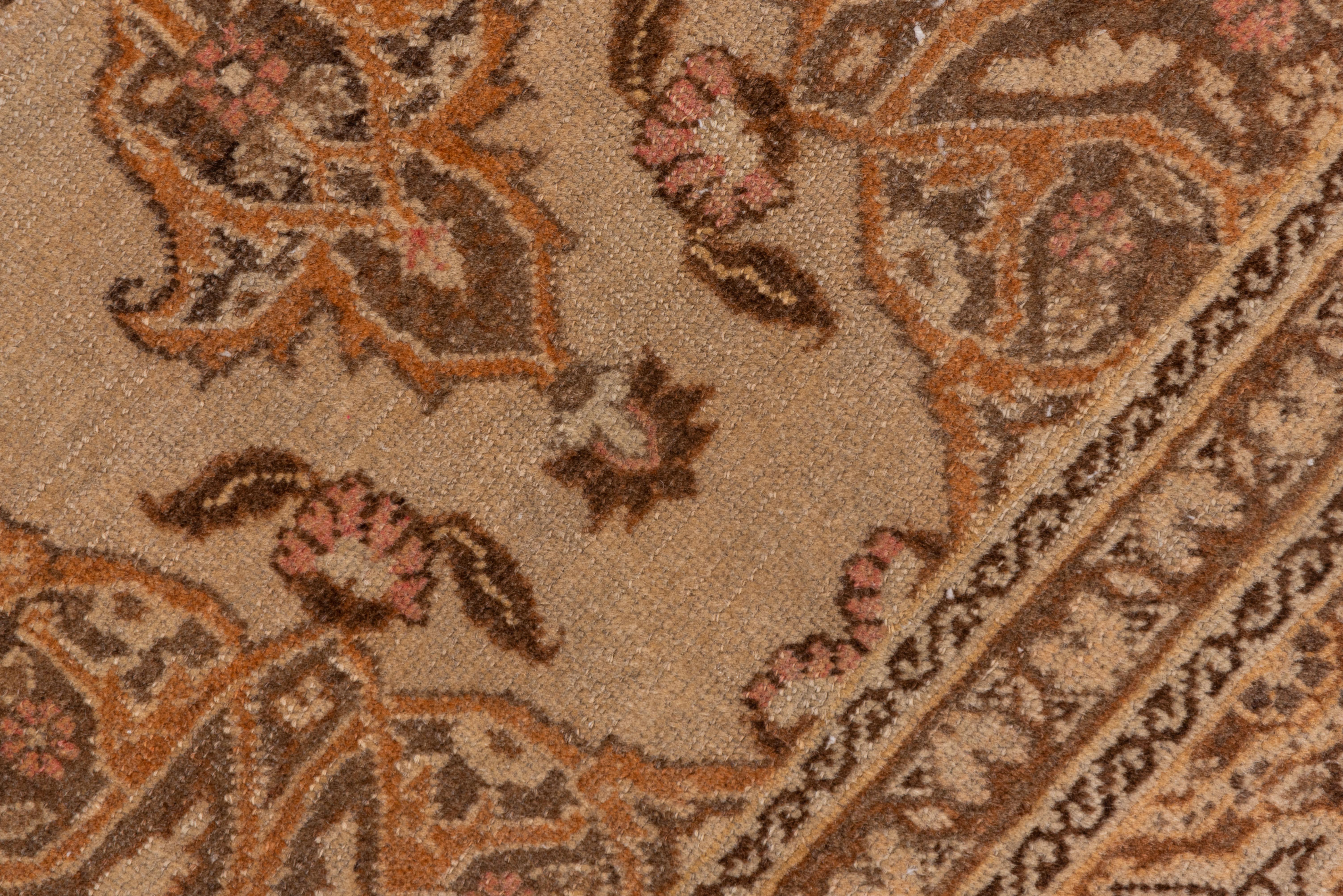 Wool Antique Tabriz Rug in Central Muted Khaki Medallion with Florets For Sale