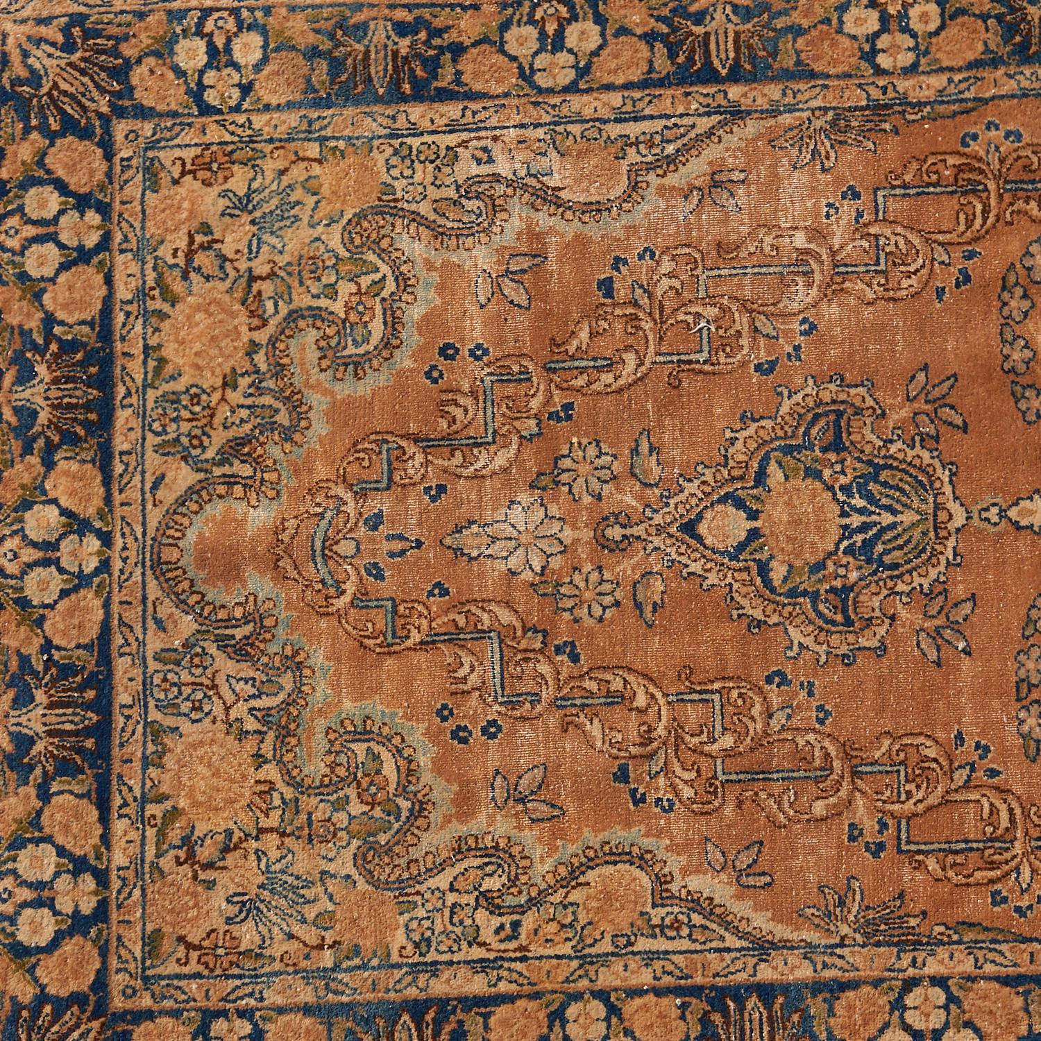 19th/20th c. Tabriz-style rug, finely woven, low pile wool-silk blend in nature inspired tones, central lozenge-shaped medallion, dark blue border.

The color palette is a very attractive feature of this Persian antique Tabriz carpet The expertly