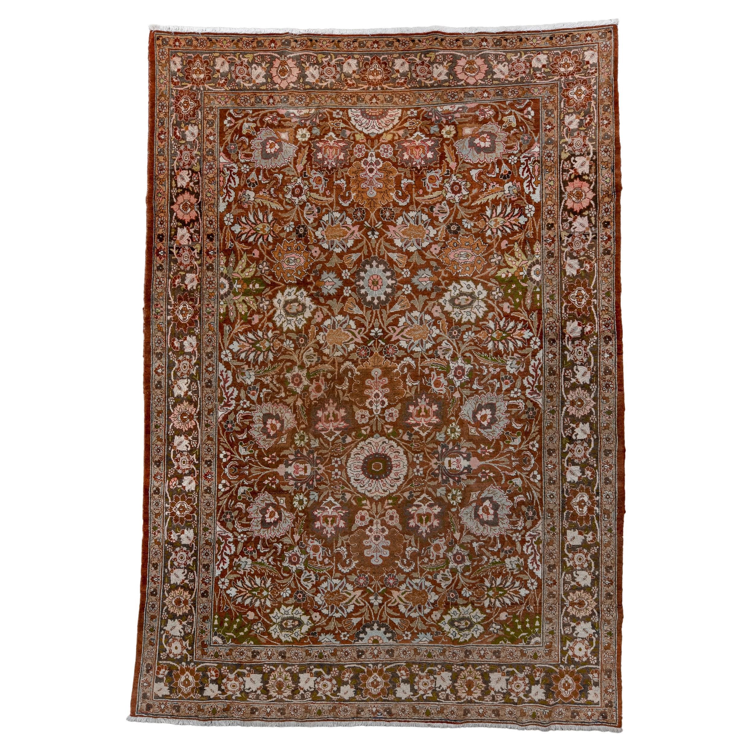 Alfombra Tabriz Antigua con Campo Rojo Cálido y Diseño de Rosetas