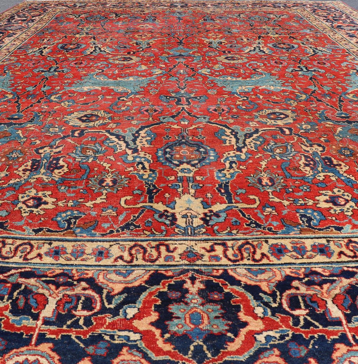 Hand-Knotted Antique Tabriz Rug with All Over Design in Rust Red, Blue's, Yellow, and L. Blue For Sale