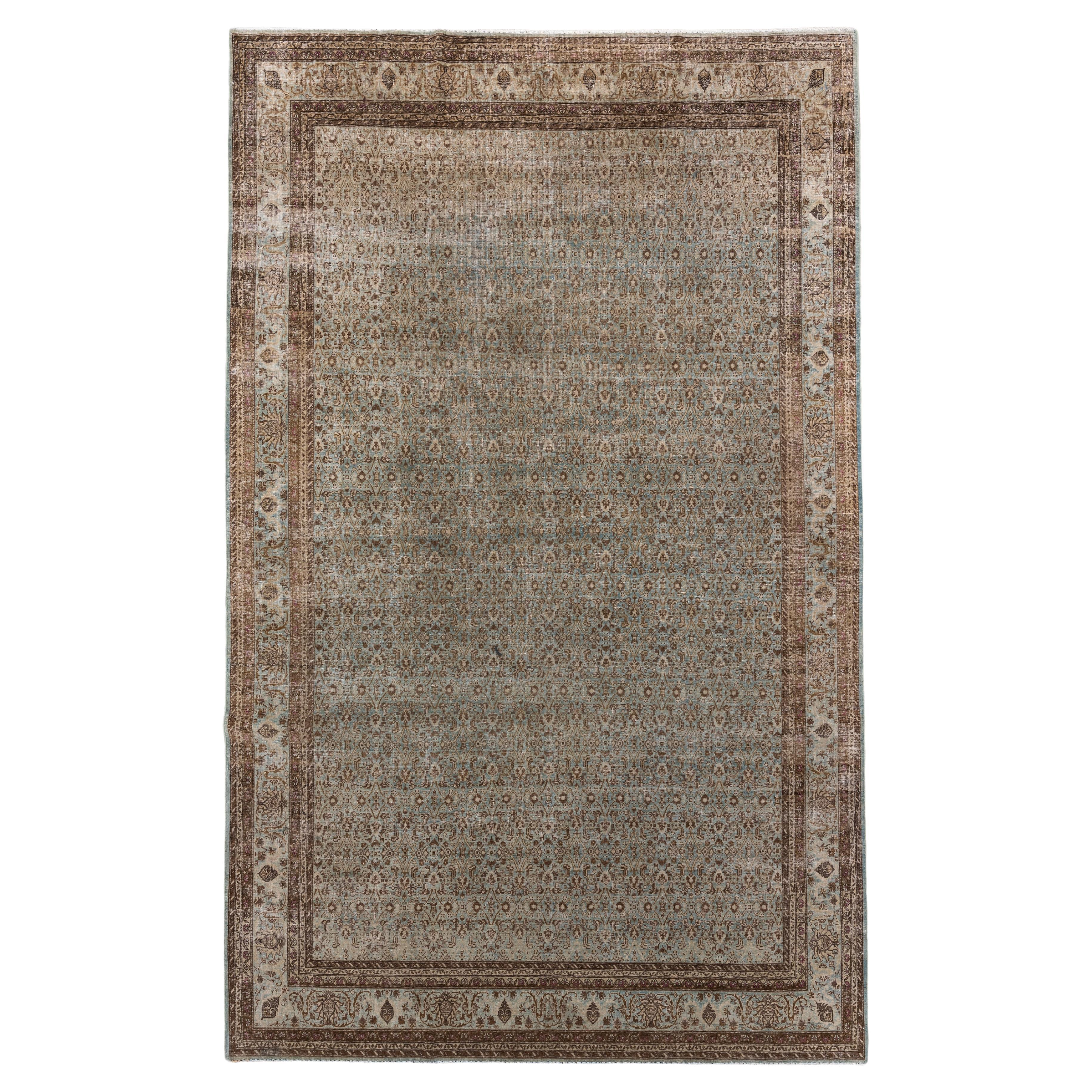 Antique Tabriz Rug with Allover Floral Pattern in Soft Blues and Neutrals For Sale