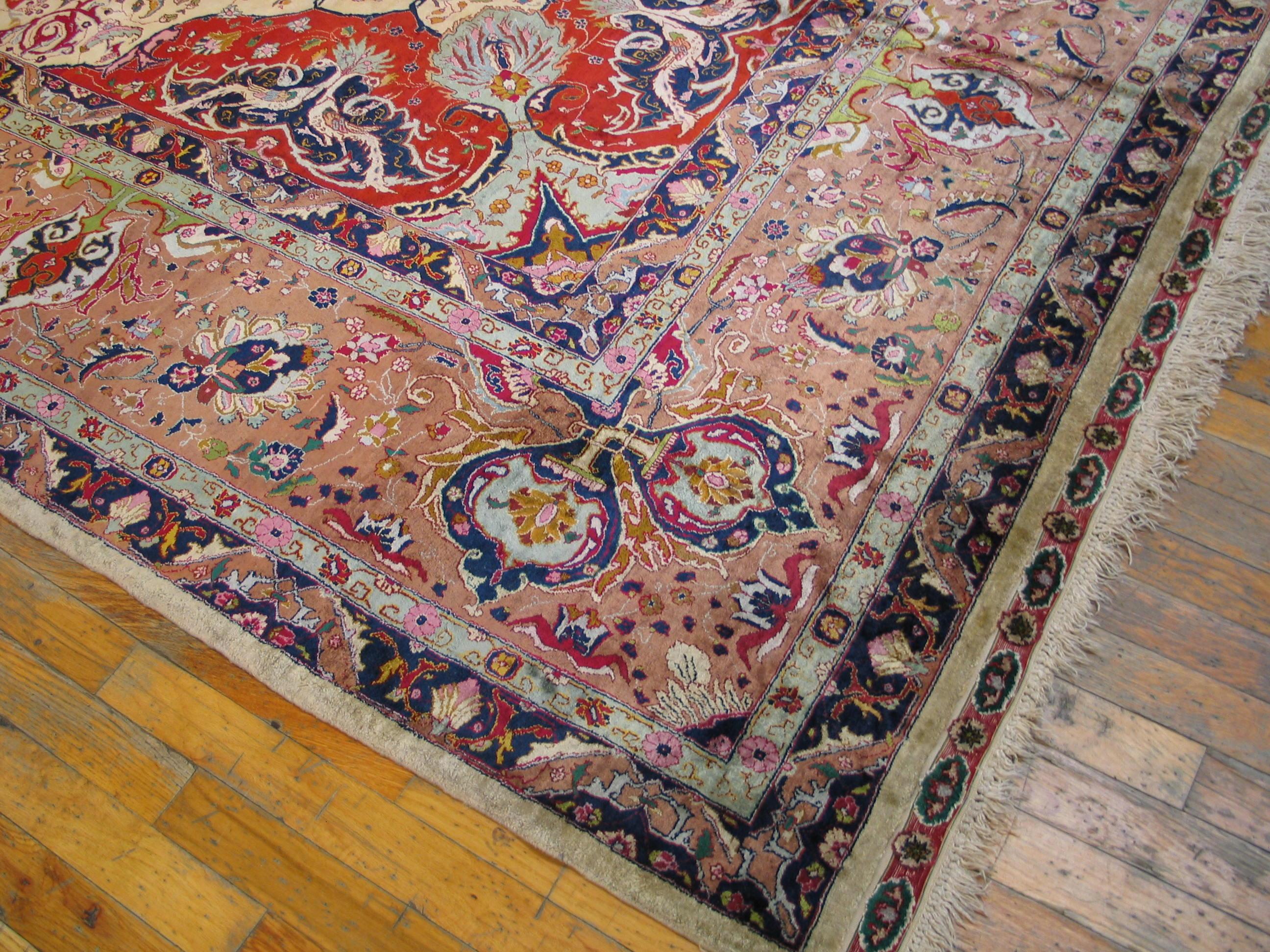 21764
Tabriz Silk Carpet
Azerbaijan Province, Northwestern Persia
10’ x 13’8” – 305 x 417 
Circa 1910
All-silk foundation, fine symmetric (Turkish) knots in silk, with narrow end bands with silk pile in relief over a flat-woven silk ground. 
This is
