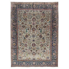 Tabriz ancien avec motif floral sous-géométrique et bordure complémentaire sur toute sa surface