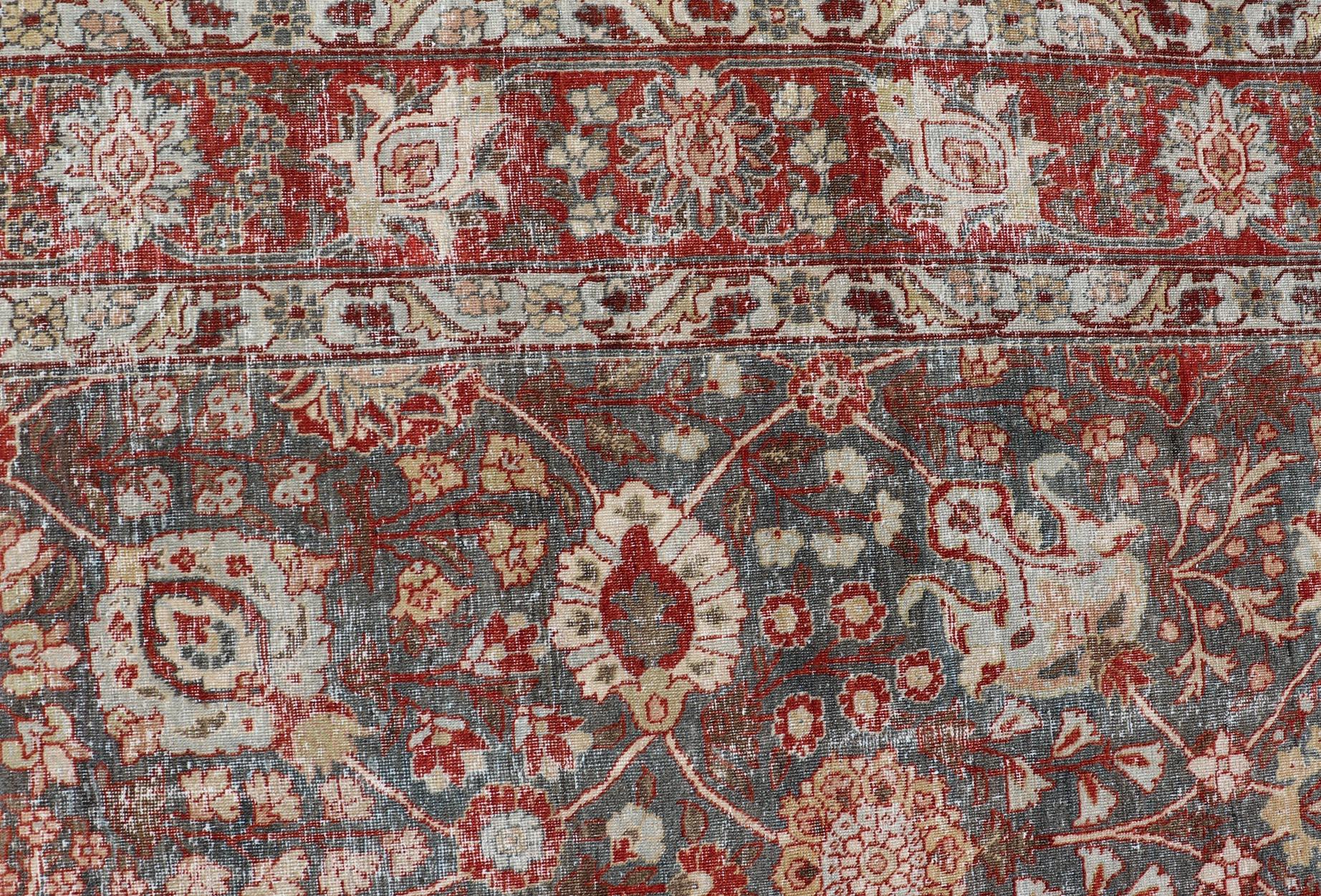 Antique Tabriz with All-Over Floral Sub-Geometric Design In Charcoal and Red In Good Condition For Sale In Atlanta, GA