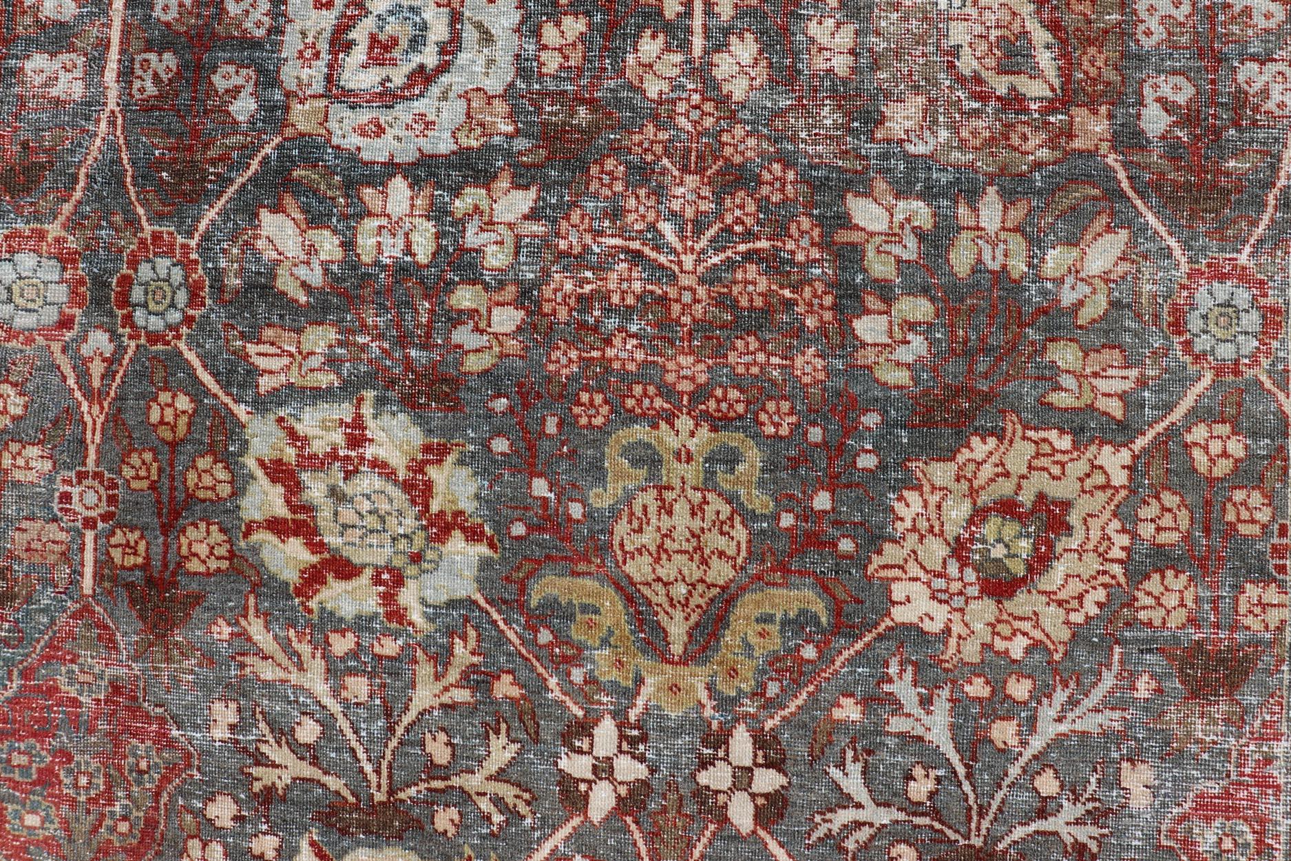 Antique Tabriz with All-Over Floral Sub-Geometric Design In Charcoal and Red For Sale 1