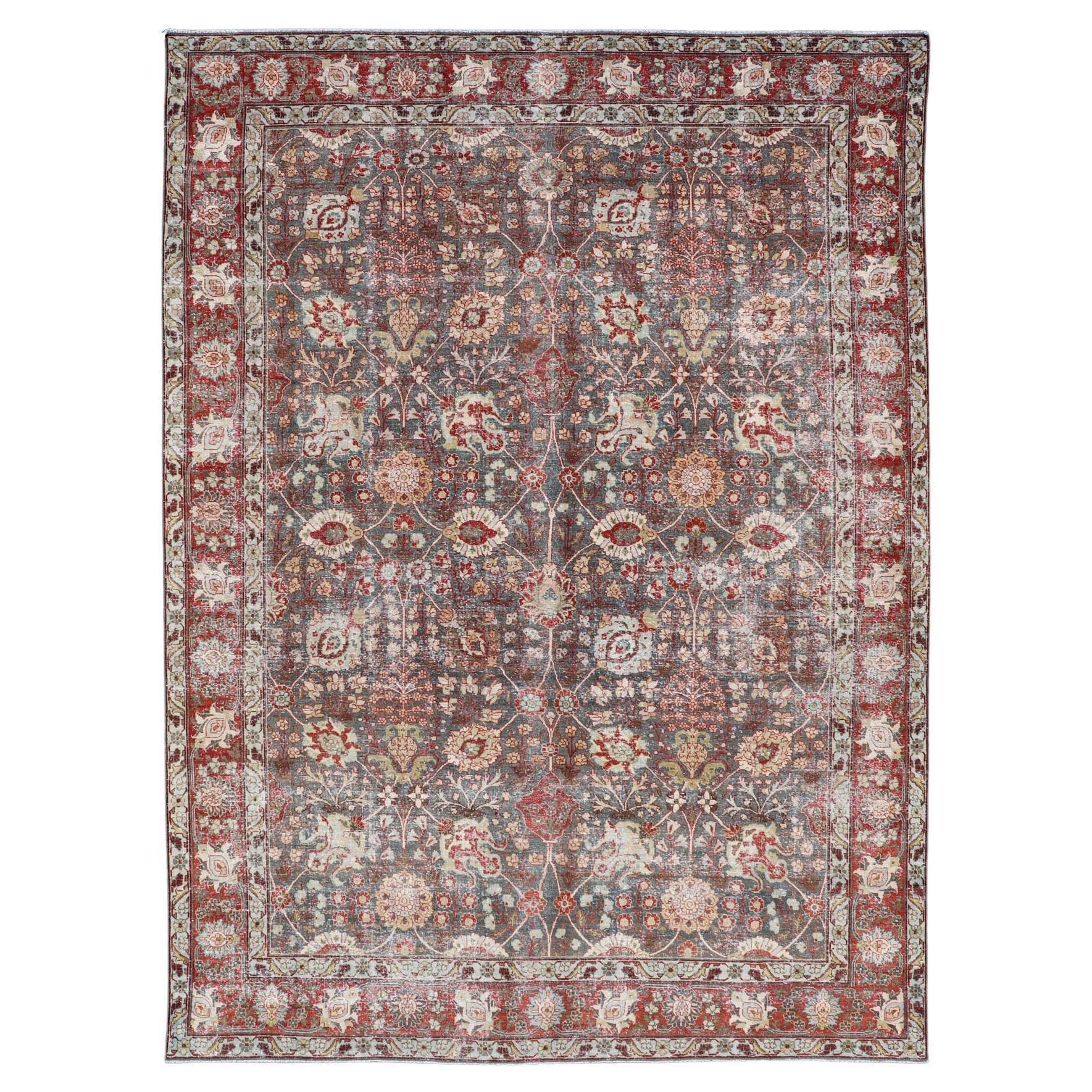 Antique Tabriz with All-Over Floral Sub-Geometric Design In Charcoal and Red For Sale