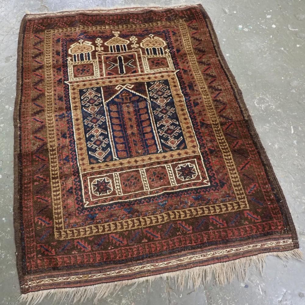 Antique Afghan Taimani Sistan Baluch 'Seh (Three) Mihrab' prayer rug
Circa 1900

This is a good example of a seh-mihrab (three mihrab) prayer rug by the Taimani Baluch, the rug is well drawn and has an 'earthy' soft colour palette, note the use of