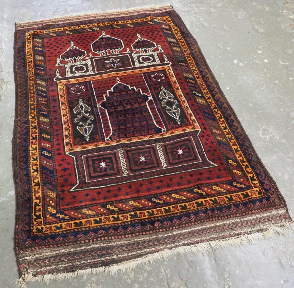 Antique Afghan Taimani Sistan Baluch 'Seh (Three) Mihrab' prayer rug
Circa 1900

This is an outstanding example of a seh-mihrab (three mihrab) prayer rug by the Taimani Baluch, the rug is well drawn and has a superb colour palette, the warm madder