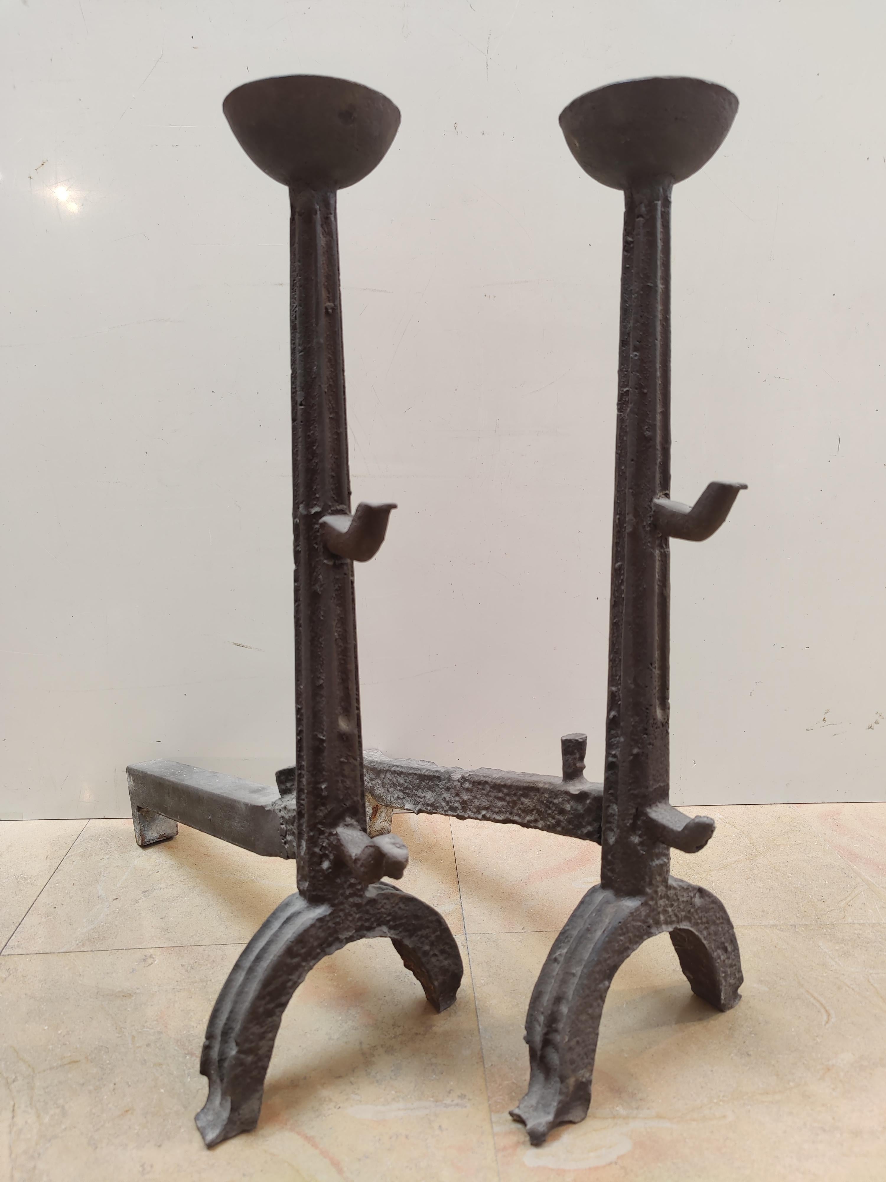 17th century andirons with oil lamp application / holder.
(restored)

Weight: 56 lbs / 25 kg.

Upon request they can be made black / pewter.

See all our antique fireplaces and fireplace accessories at 1stdibs by pressing the ‘View All From Seller’