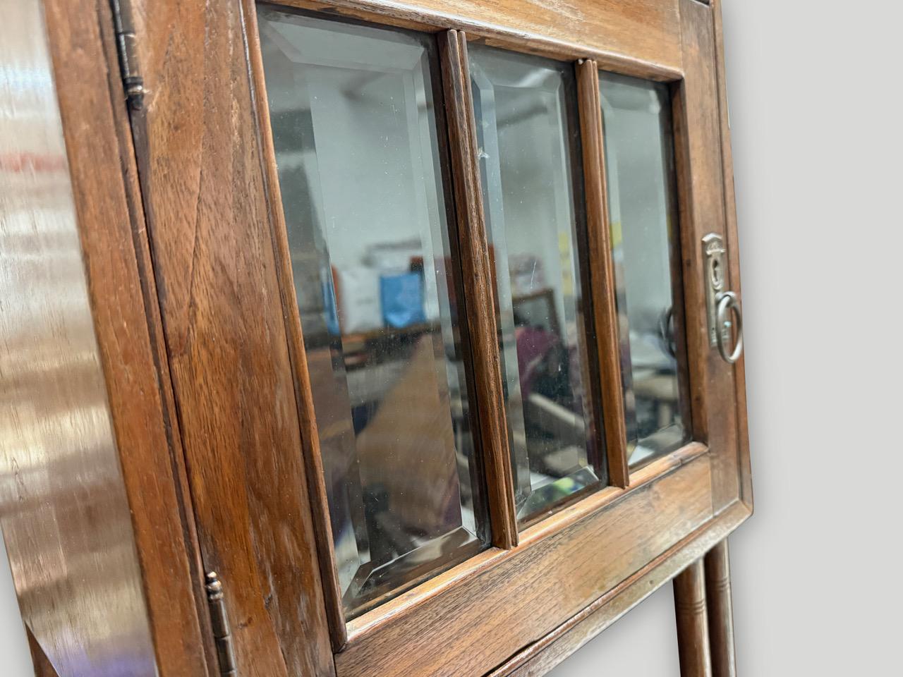 Milieu du XXe siècle Antiquities Tall Cabinet en vente