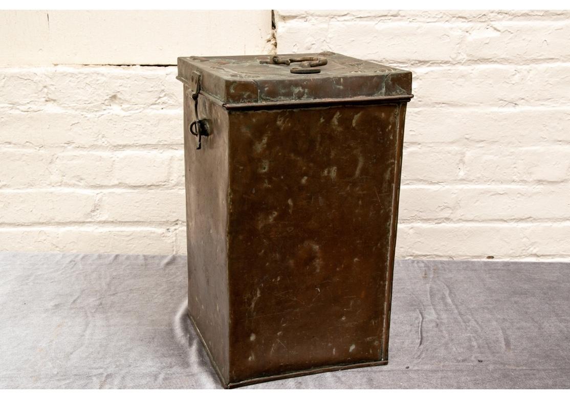 An authentic and all original condition copper Repoussé food storage chest. Tin lined with repousse palmettes on the hinged lid. Brass top handle and lock plate. Originally acquired from a large collection of Nautical items.
Measures: 9 1/4 x 9