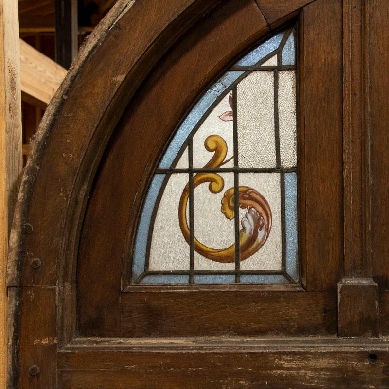 Hungarian Antique Tall Glass French Doors With Stained Glass Arched Transom With Fleur De 