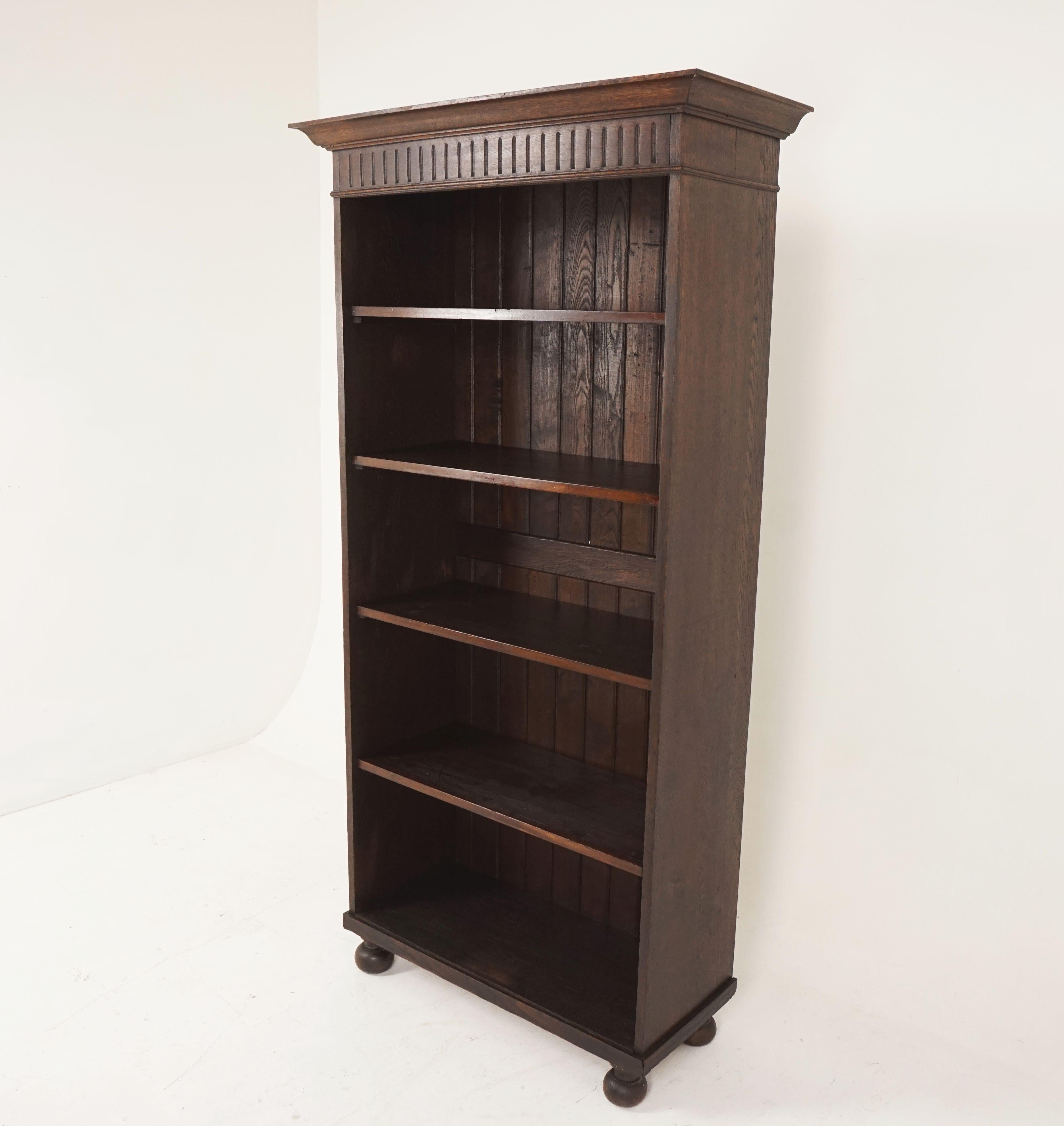 Antique tall oak open bookcase, display cabinet, Scotland, 1910

Scotland, 1920
Solid oak
Original finish
Shaped cornice with frieze below
Attractive paneled back boards
Four wooden shelves
All raised on four bun feet
Very functional