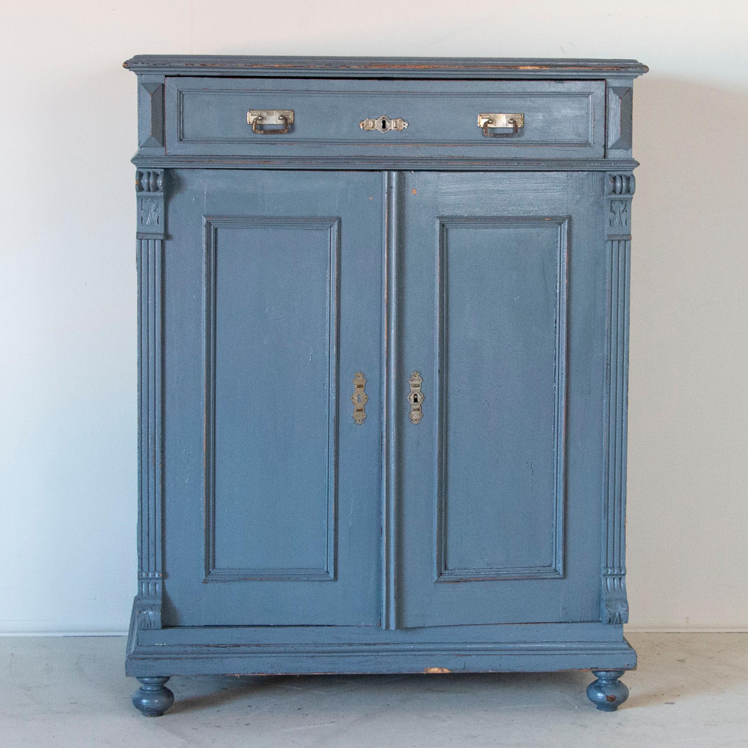 While blue was a traditional paint color used in Swedish antiques and cabinetry, it can be difficult to find original painted pieces due to their ongoing popularity. This lovely pine sideboard is special find due to the original blue painted finish