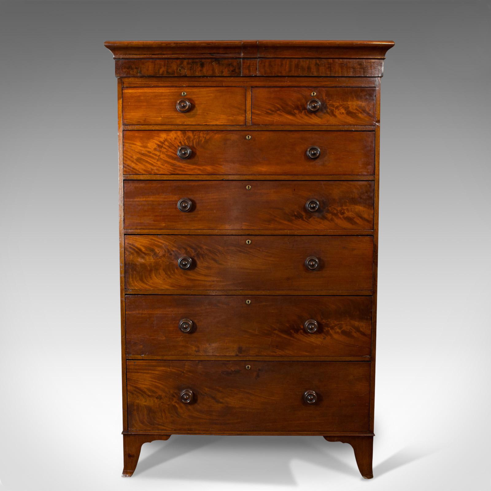 This is an antique tallboy. An English, flame mahogany tall chest of drawers, dating to the early Victorian period of the mid-19th century, circa 1850 and later.

Highly appealing tallboy of elegant proportion
Displaying a desirable aged patina