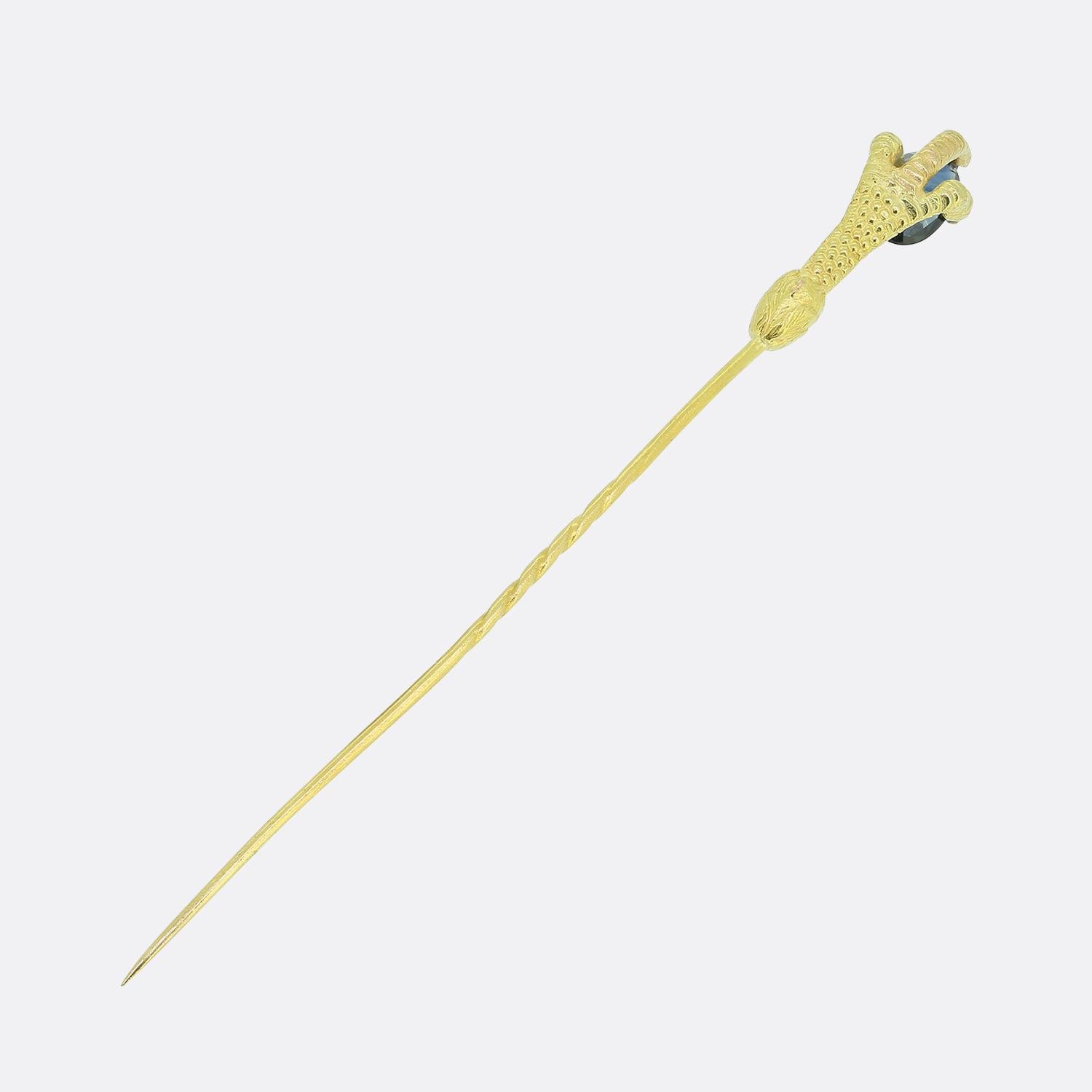 This is a rare and high quality 18ct yellow gold talon stick pin. The pin dates back to the early 1900s, is of French origin and plays host to a single blue sapphire. 

Condition: Used (Very Good)
Weight: 5.0 grams
Claw Dimensions: 25mm x 8mm x