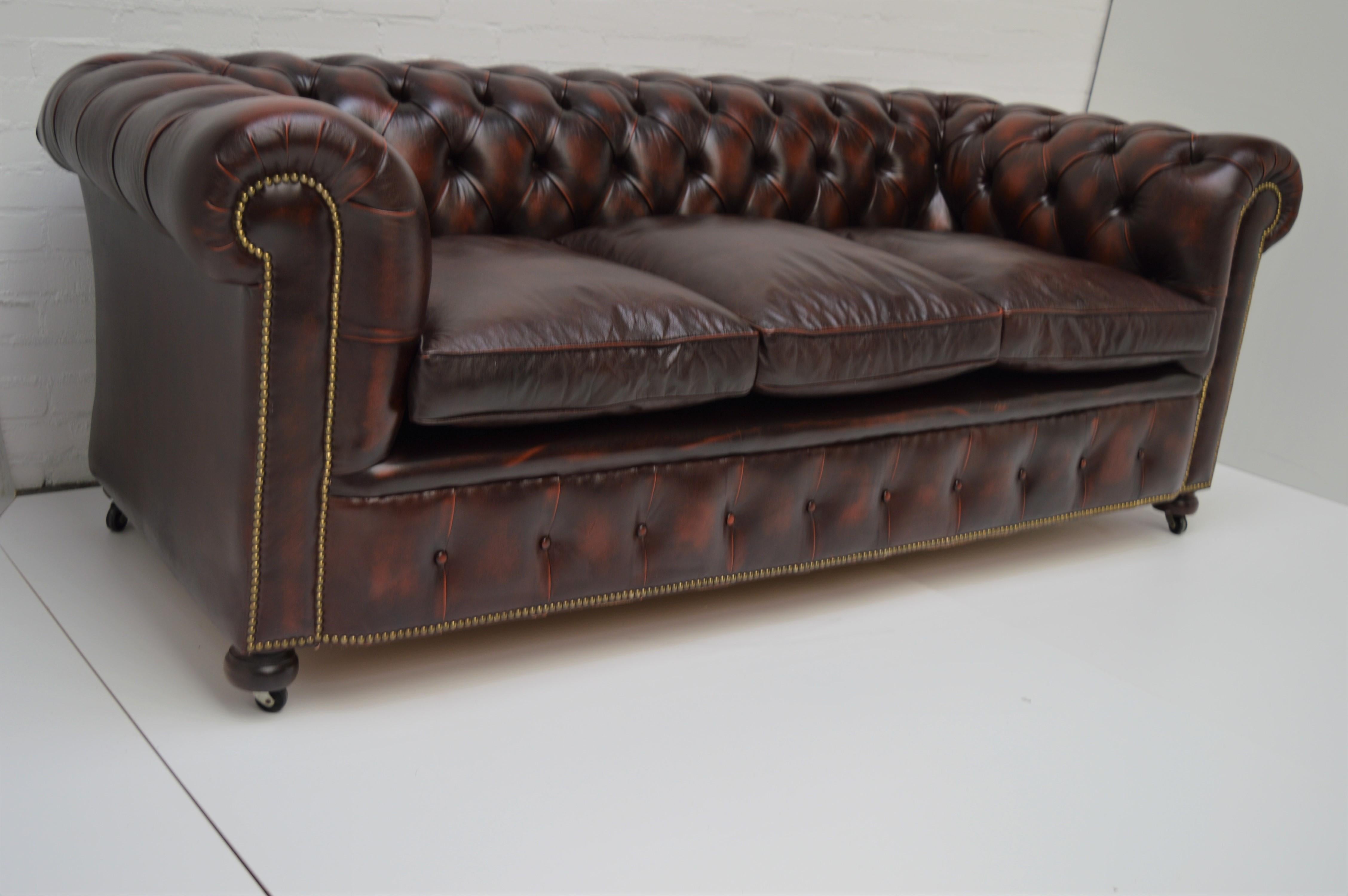 Bery nice authentic antique Tan Chesterfield sofa in very good condition. Heavy, with coil sprung and solid frame. Checked inside out and comes with 3 years of warranty on the frame/sprung/cushions.

For the Classic Chesterfield lovers who like a