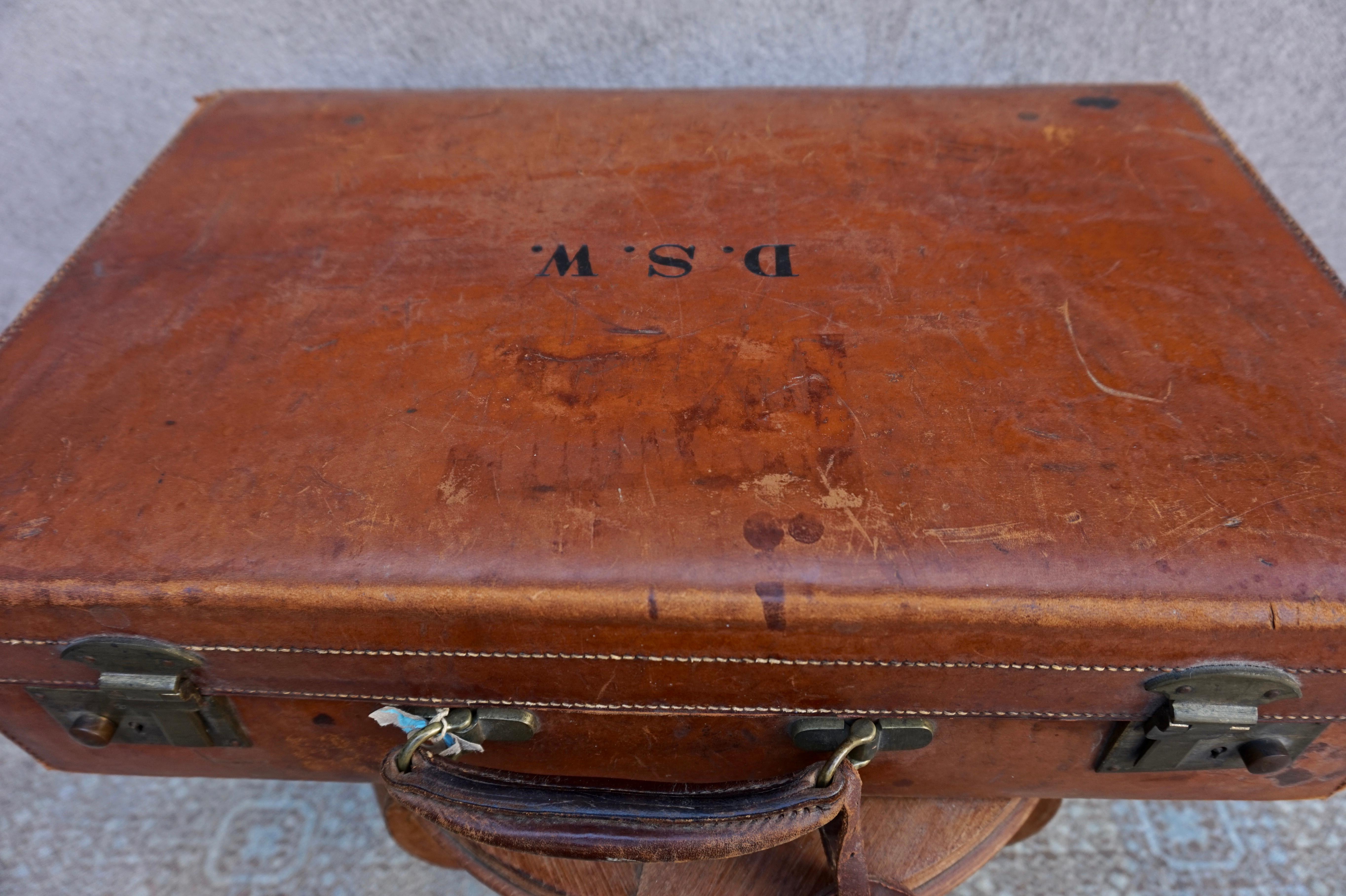 Very Rare British briefcase with initials DSW. Possibly belonging to Douglas S. Warren (on name tag) who was a Canadian Air Force pilot in WW2 and Commanding Officer in the RAF later when he spent time in England in the early 50's. In original