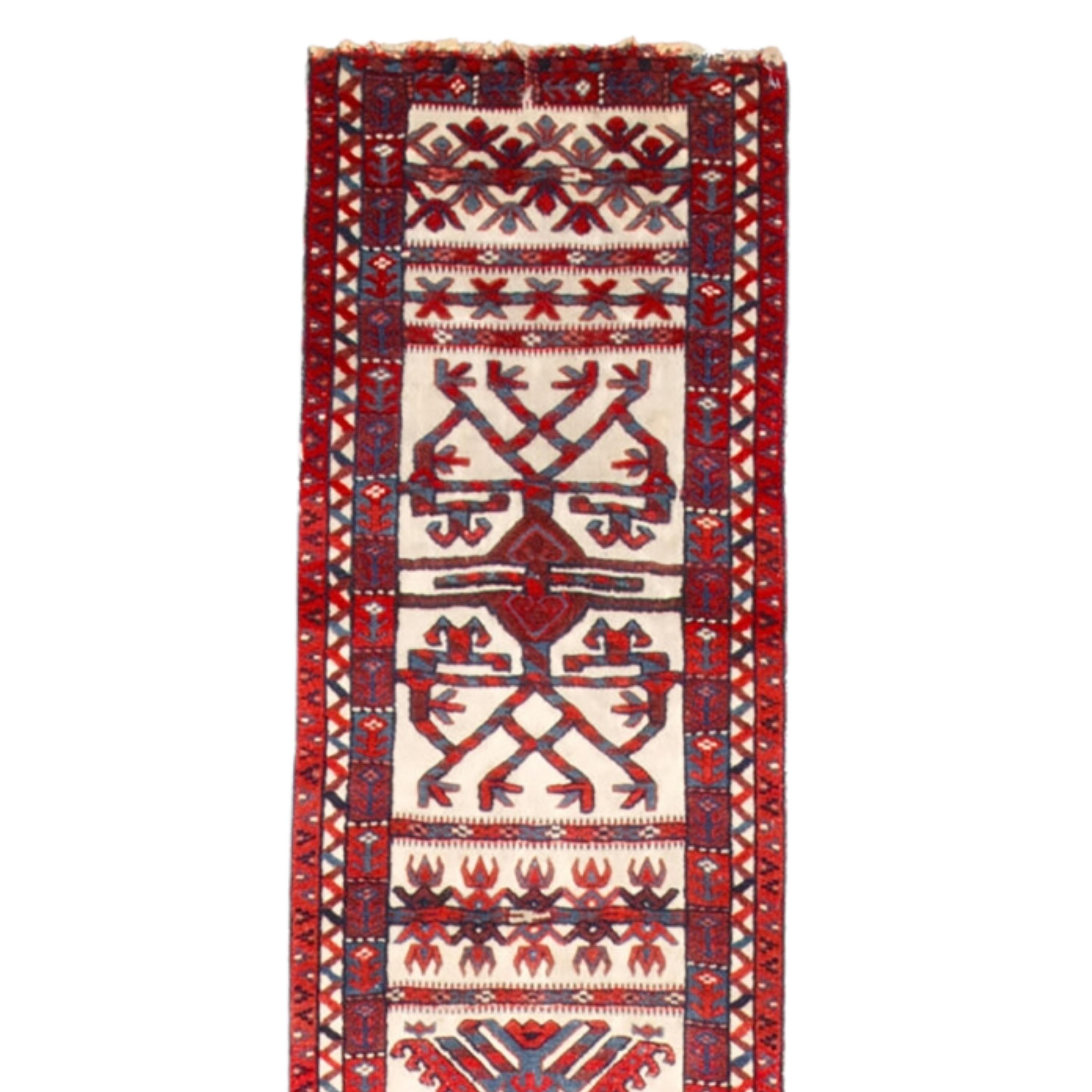 A Unique Piece of the 19th Century: Antique Turkmen Tandband Carpet

This elegant 19th century Turkmen Tandband rug is a work of art that can enchant any space with its carefully woven details and rich color palette. Traditional motifs embroidered