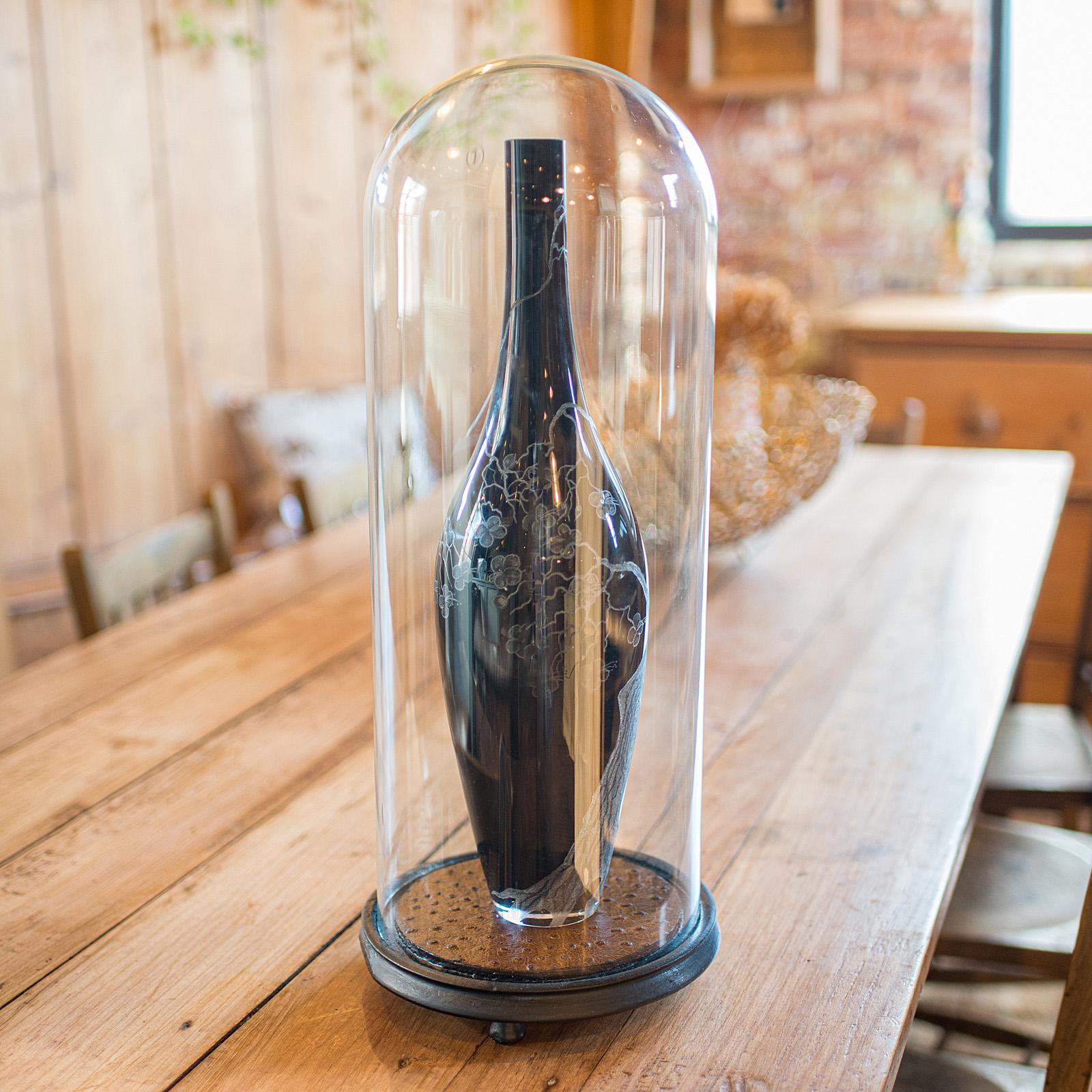 
This is an antique taxidermy specimen dome. An English, glass and ebonised beech tall showcase, dating to the late Victorian period, circa 1900.

Well proportioned Victorian dome, ideal for displaying medium-tall exhibits
Displays a desirable aged