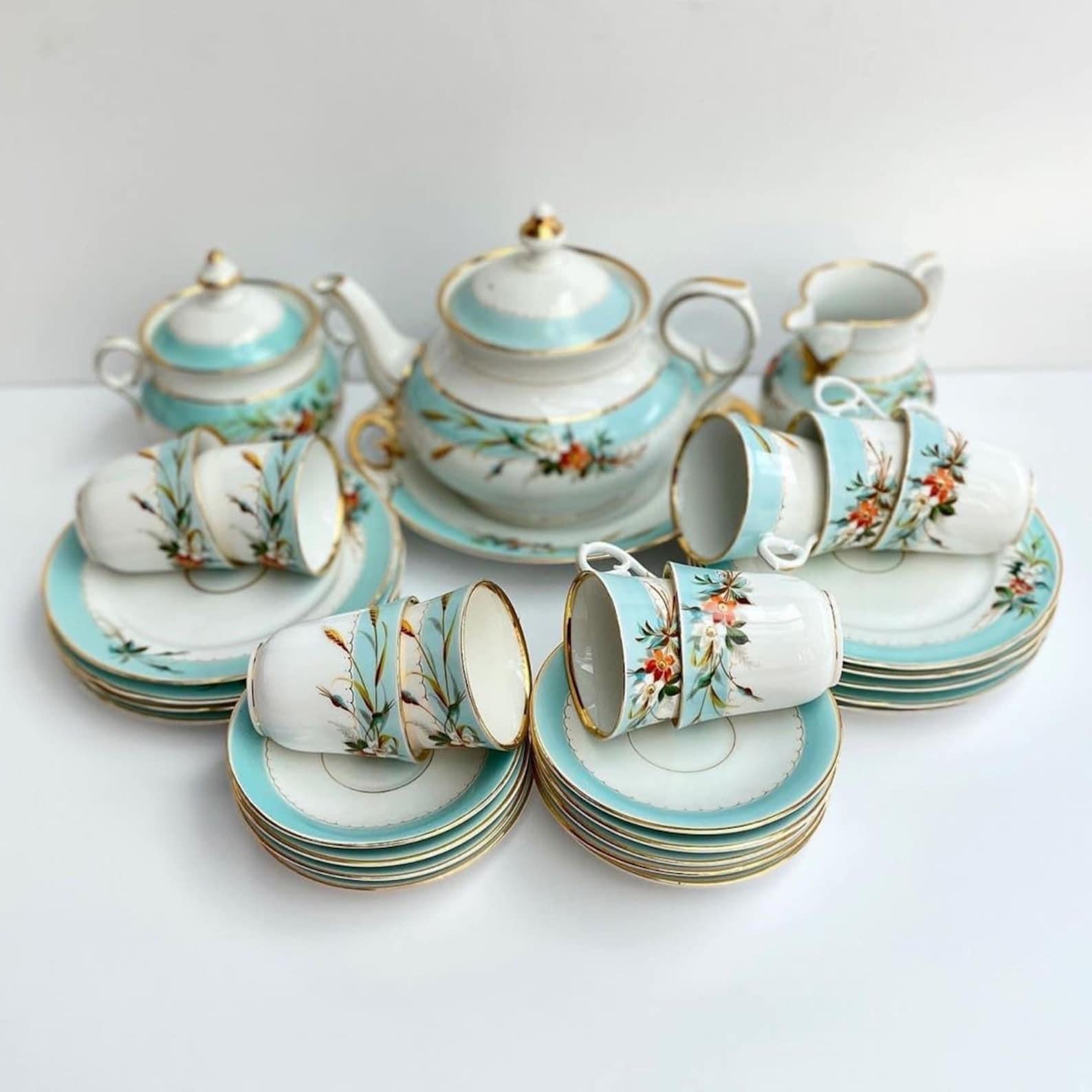 Exquisite porcelain antique tea set.

The end of the XIX century!

C. Tielsch, Germany.

Tableware for 9 people.

31 subjects

Hand-painted.

 I have provided a lot of pictures to best describe the condition of this item.

 In great condition. No