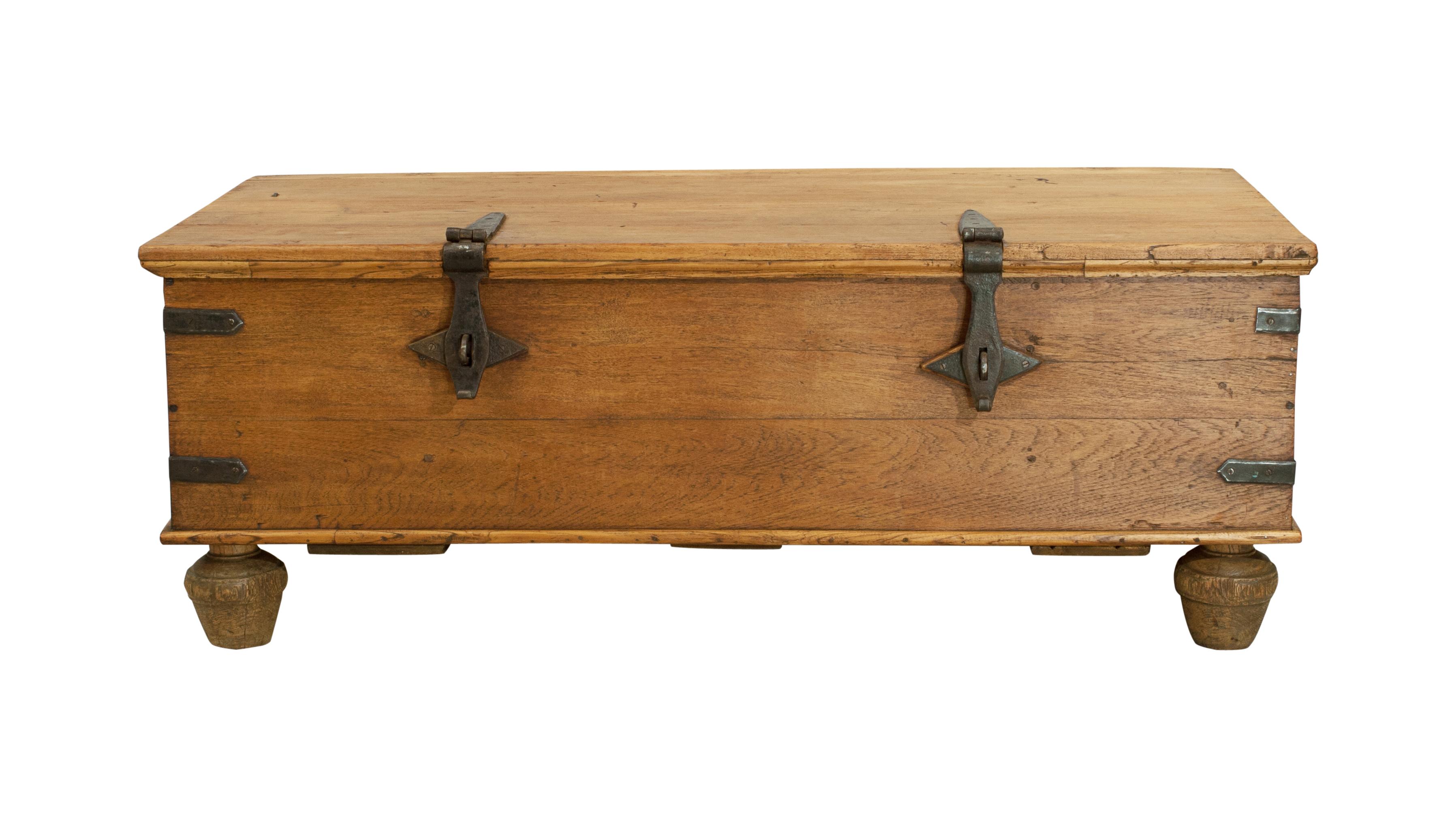 Vintage coffee table chest.
This beautiful large solid teak coffee table trunk has ample inner storage, can be used as a handy storage coffee table, blanket box or for any other household storage. Raised on four turned wooden feet. A great piece of