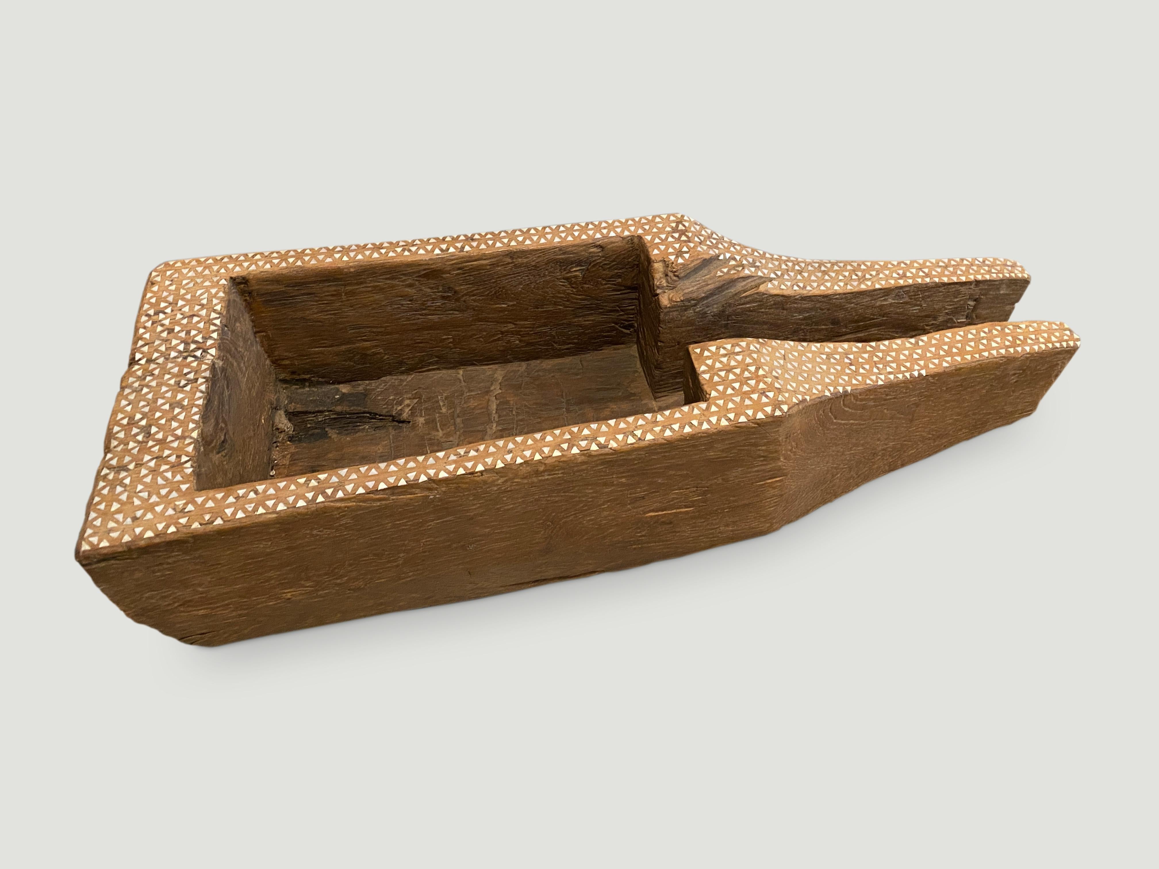 Beautiful aged teak wood container originally used to store rice. We have added the shell inlay by hand to the top section. A multiple of uses such as storing towels, magazines, firewood etc etc

This antique container was sourced in the spirit of