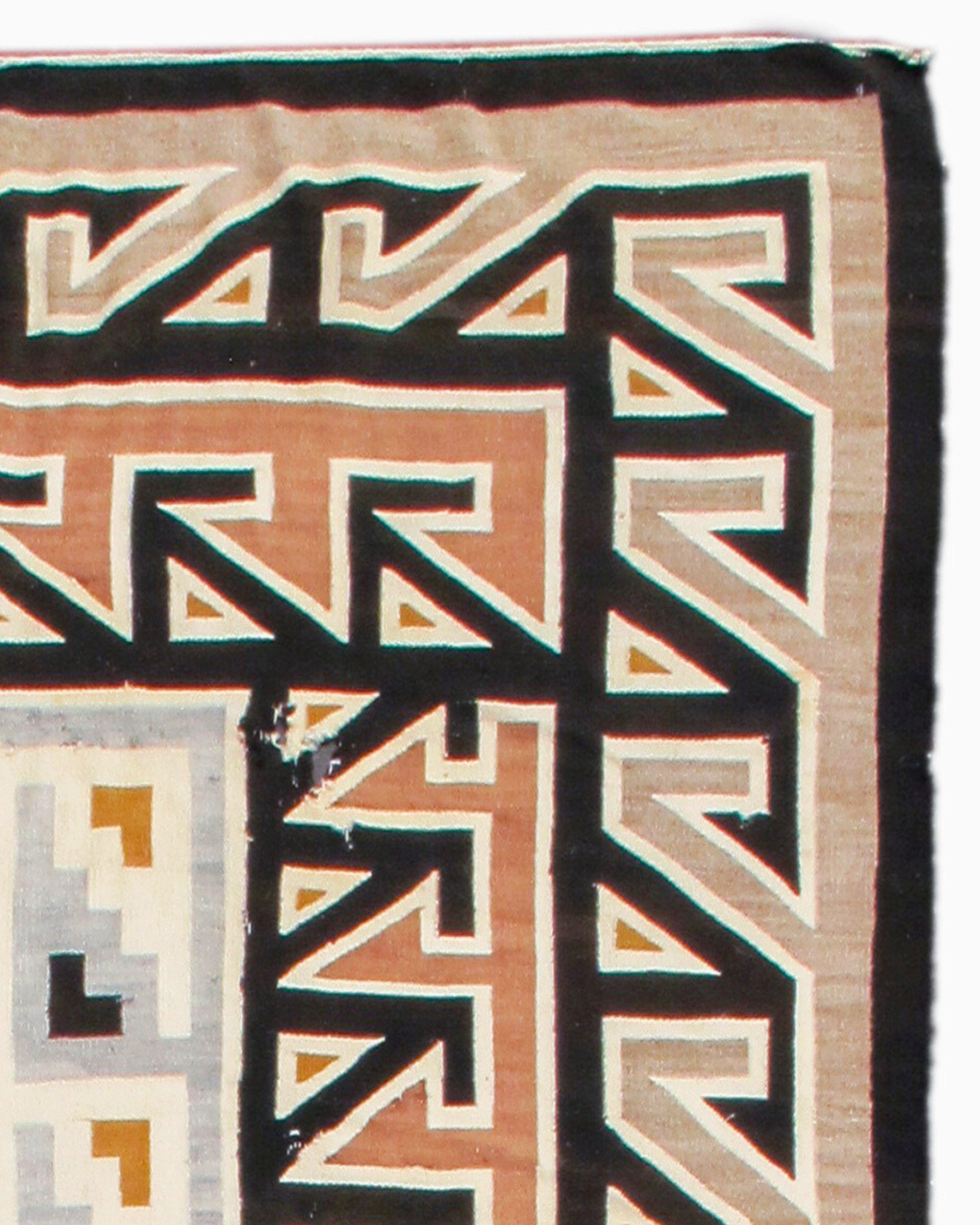 Antique Teec Nos Pos Navajo Rug, Early 20th Century

Teec Nos Pos is a small community in Apache County, Arizona. The community is located six miles southeast of the Four Corners Monument. The name Teec Nos Pos is pronounced 
