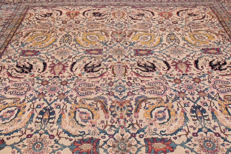 Persian Antique Tehran Blue and Yellow Wool Rug with Trees, Birds and All-Over Pattern For Sale