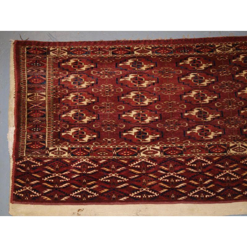 Antique Tekke Turkmen chuval of very fine weave, the chuval is complete with an ivory plain weave back. note the boxed border design and the attractive element.

Additional information:
Origin: Turkish
Age: Circa 1900
Size: 3ft 10in x 2ft 4in (117 x