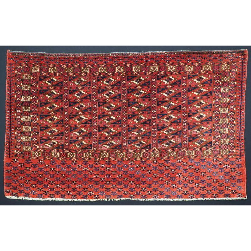 Antique Tekke Turkmen chuval with 'Aina' guls.

An exceptional pair of chuval faces by the Tekke Turkmen. The faces have the aina gul design, there are 36 guls to each face. Alternate guls have opposing quarters in crimson silk. The main border is