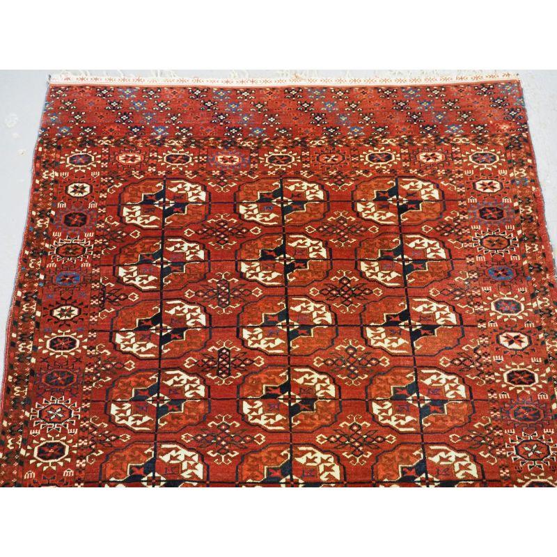 Antique Tekke Turkmen rug, this size of rug is known as ‘dip khali’ which means 'half carpet'.

2nd half 19th century.

The rug is very well drawn with 3 rows of 9 Tekke guls, which are of a large rounded shape. The minor gul is of a classic Tekke