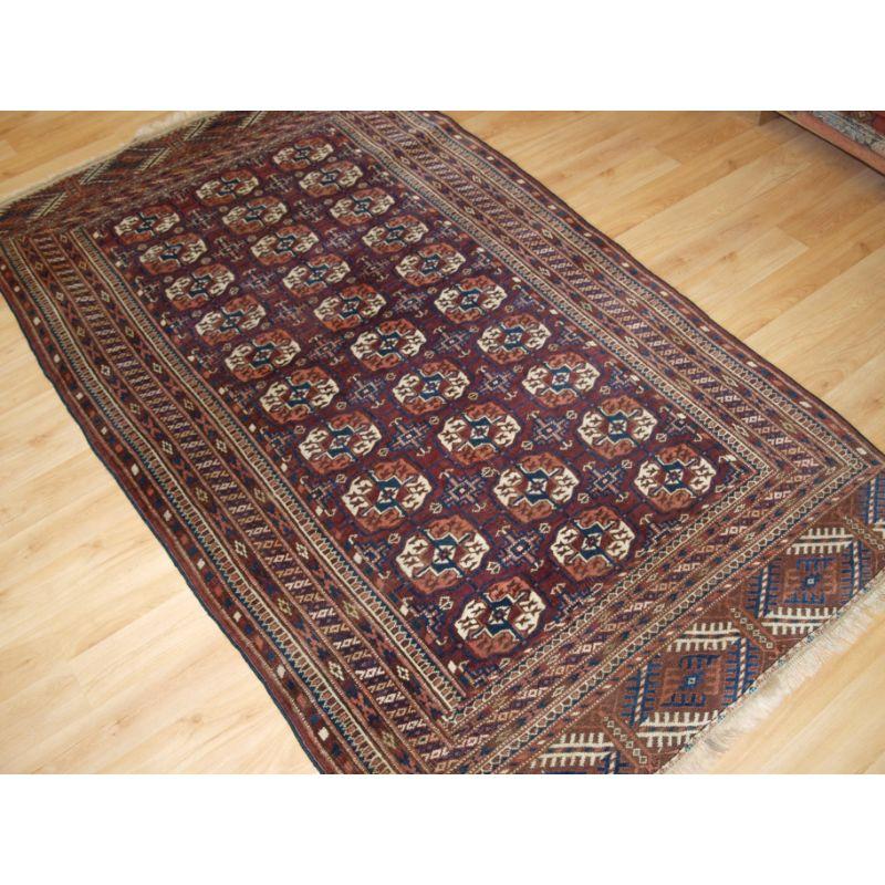 Antique Tekke Turkmen ‘dip khali’ rug with good colour.

These are considered to be ‘half size’ rugs; half the length and half the width of a main carpet.

This example has 3 rows of 10 Tekke guls of large round shape.

The rug is in excellent