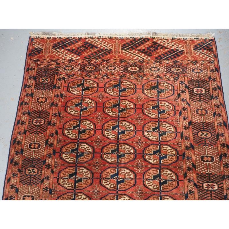Turkmène Tapis turkmène Tekke « Drop Khali » ancien, rouge chaud et doux, vers 1900 en vente