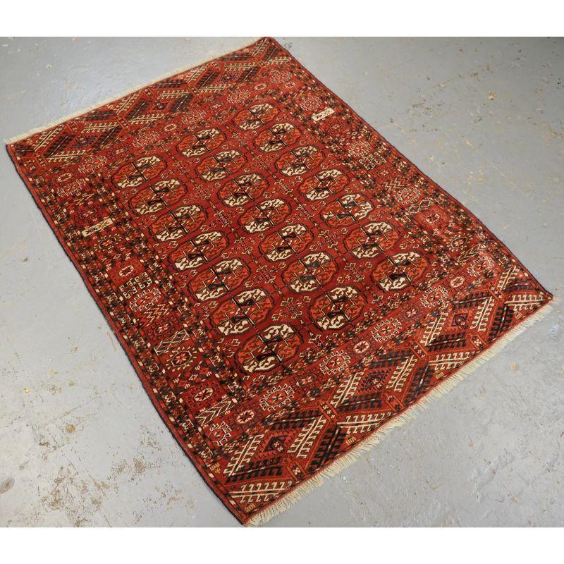Antique Tekke Turkmen dowry rug of fine weave and small size.

These rugs are considered to be ‘dowry’ weavings used by the Turkmen bride on her wedding day.

This example has 3 rows of 7 Tekke guls, the rug has a very well drawn and detailed