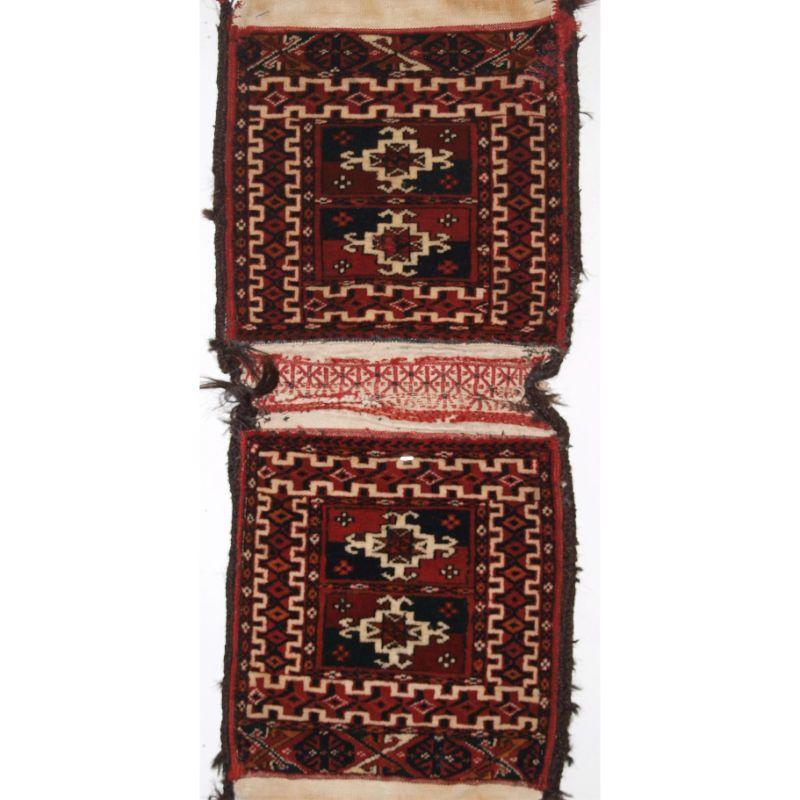 Antique Tekke Turkmen khorjin (saddle bag) of very small size, Southern Turkmenistan.

Complete khorjin of this quality are quite scarce, this example is in outstanding condition and benefits from a beautifully decorated central panel. The bags