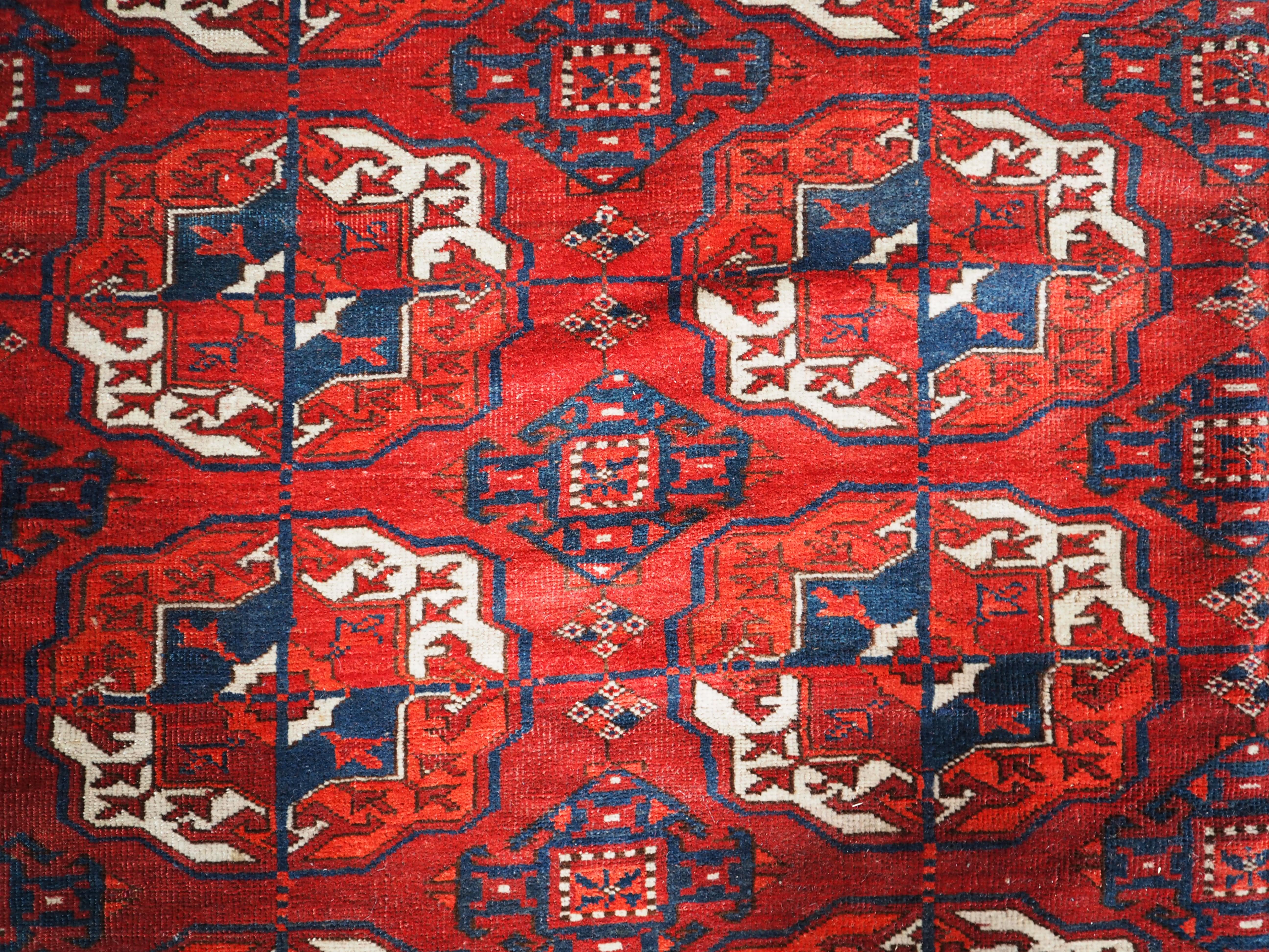 Hand-Woven Antique Tekke Turkmen Main Carpet with 4 Rows of 10 Guls For Sale