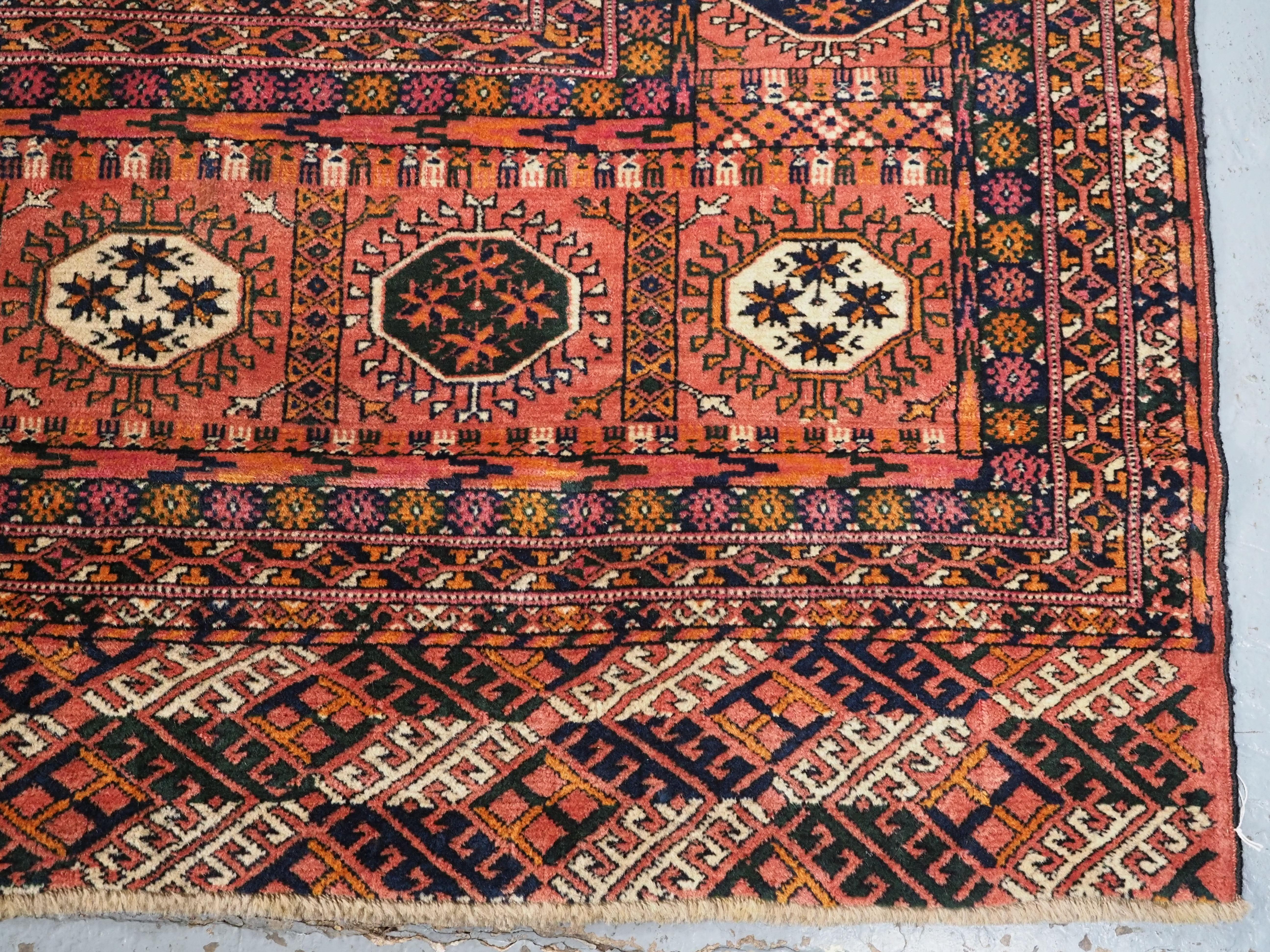 Antique Tekke Turkmen main carpet with 4 rows of 12 guls.  Circa 1900. For Sale 6