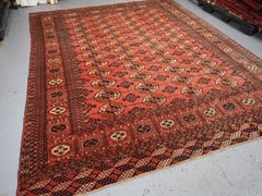 Antique Tekke Turkmen main carpet with 4 rows of 12 guls.  Circa 1900.