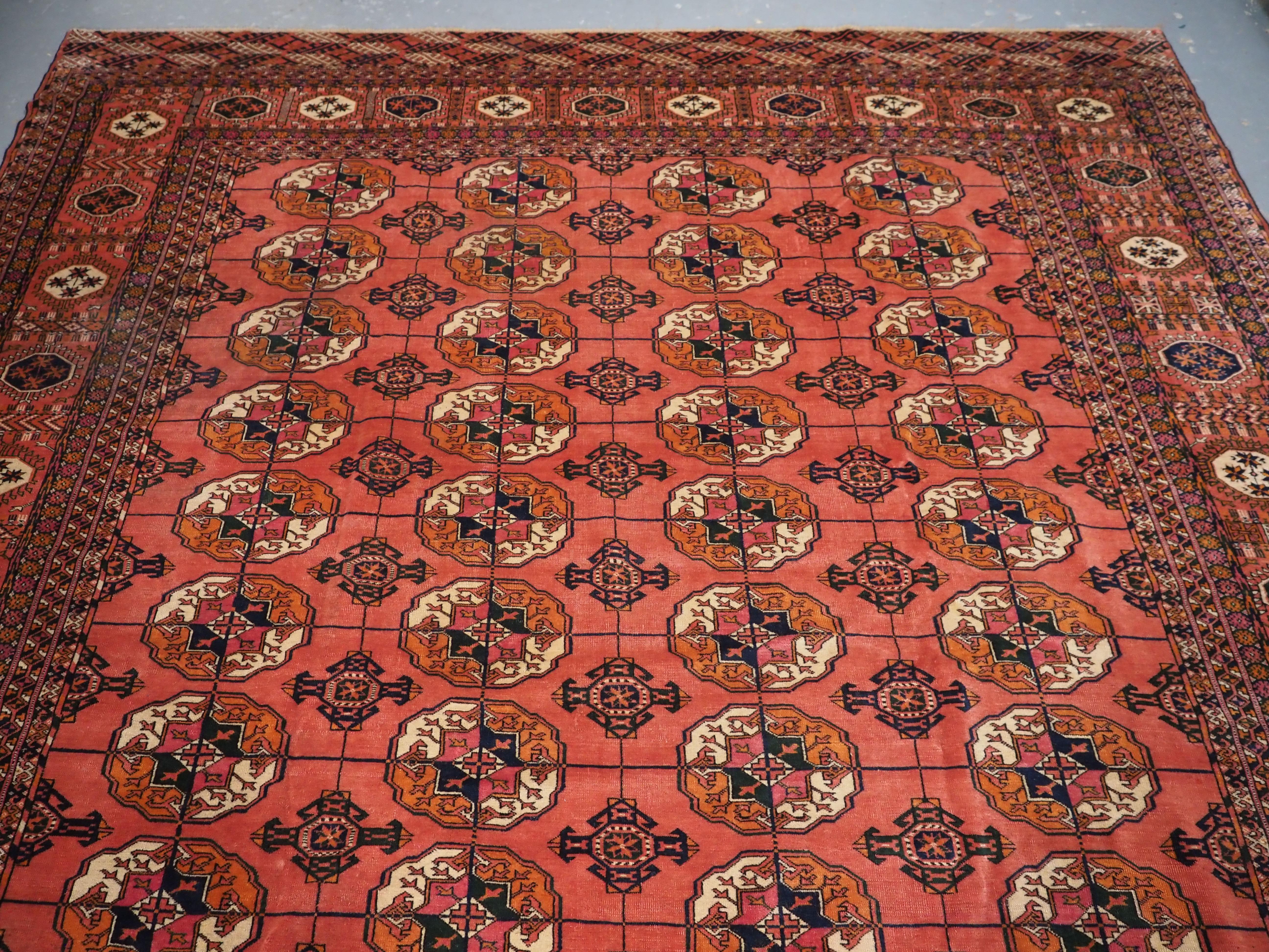 Caucasian Antique Tekke Turkmen main carpet with 4 rows of 12 guls.  Circa 1900. For Sale