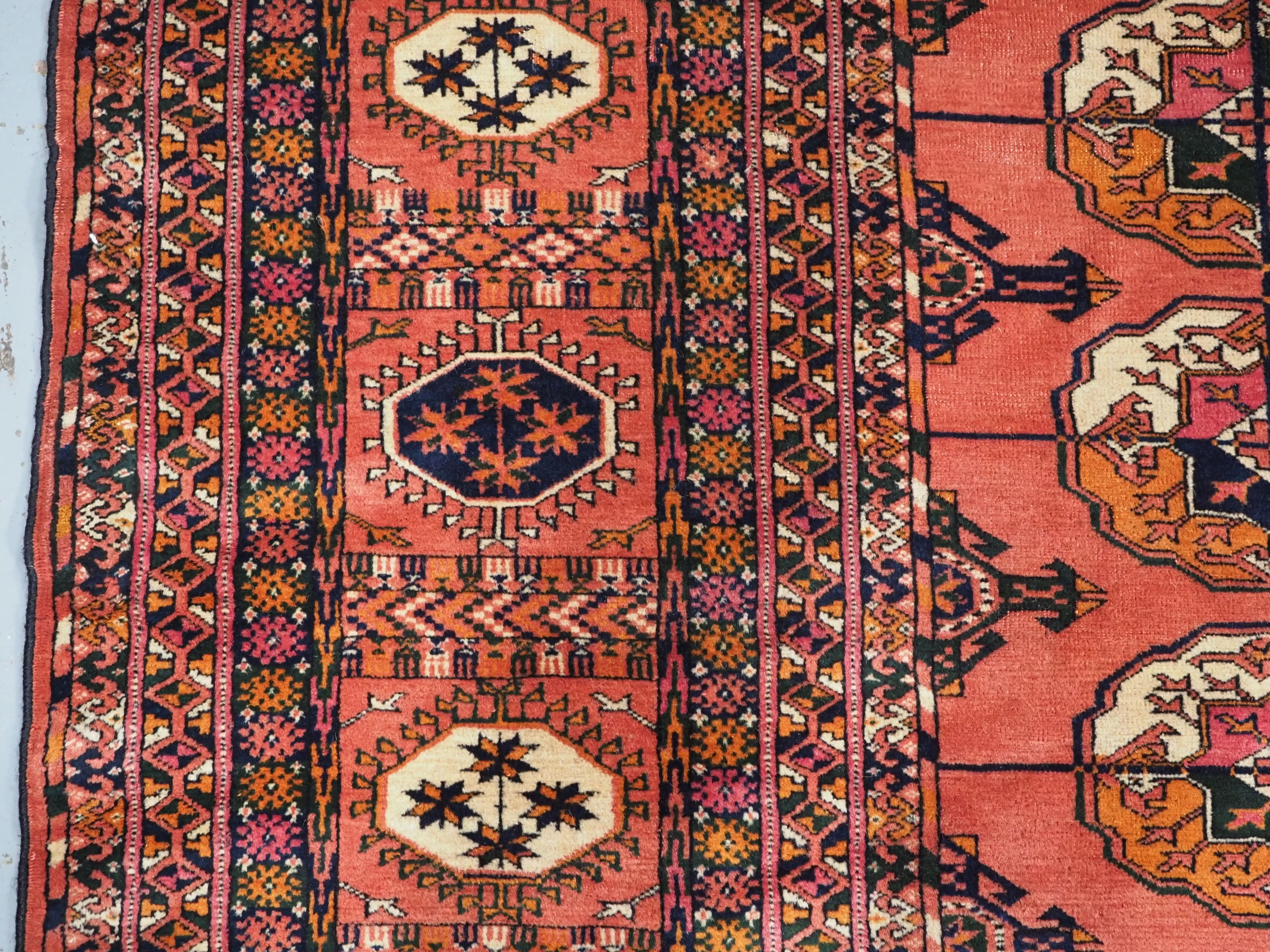 Antique Tekke Turkmen main carpet with 4 rows of 12 guls.  Circa 1900. For Sale 1