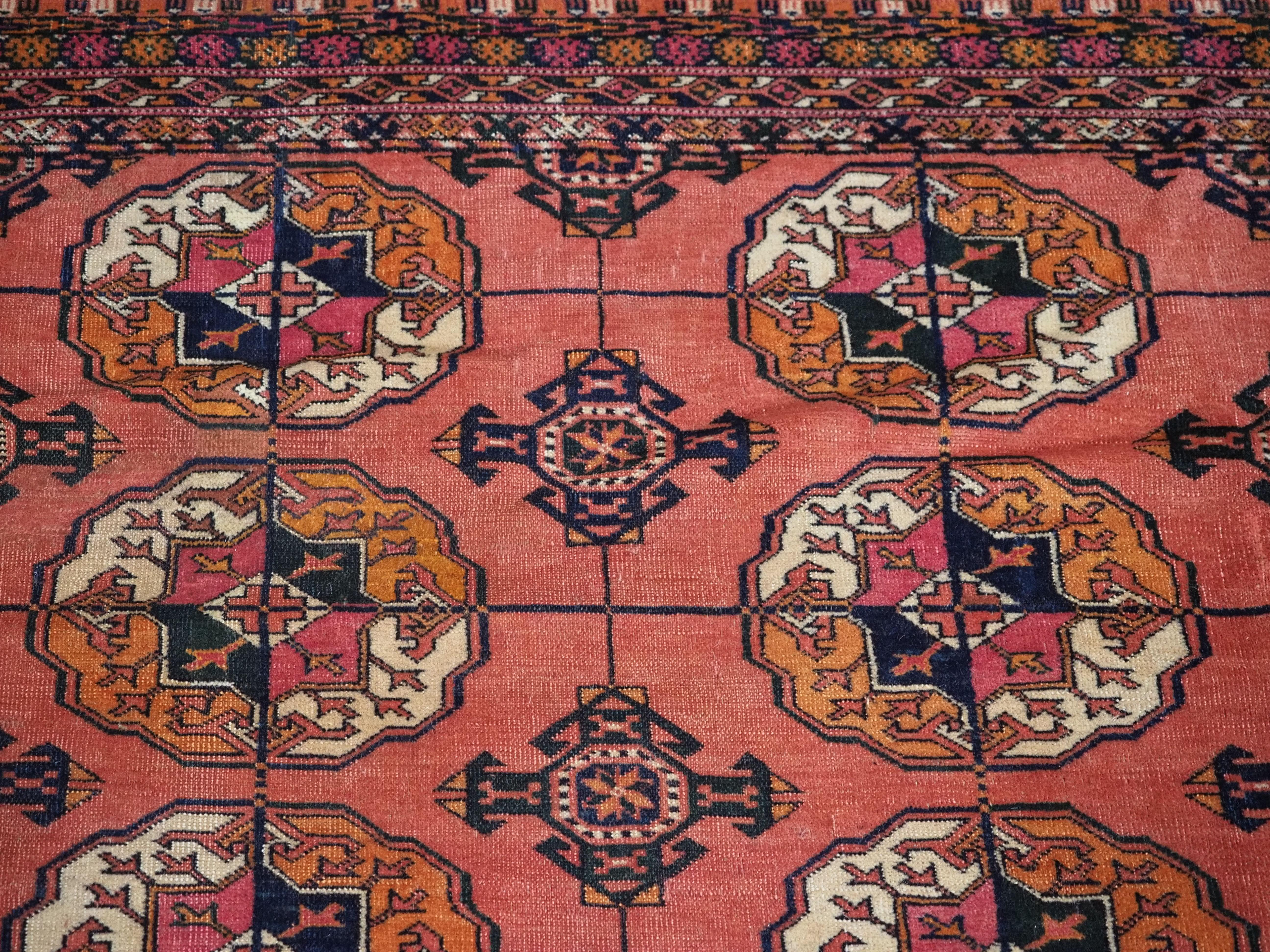 Antique Tekke Turkmen main carpet with 4 rows of 12 guls.  Circa 1900. For Sale 2
