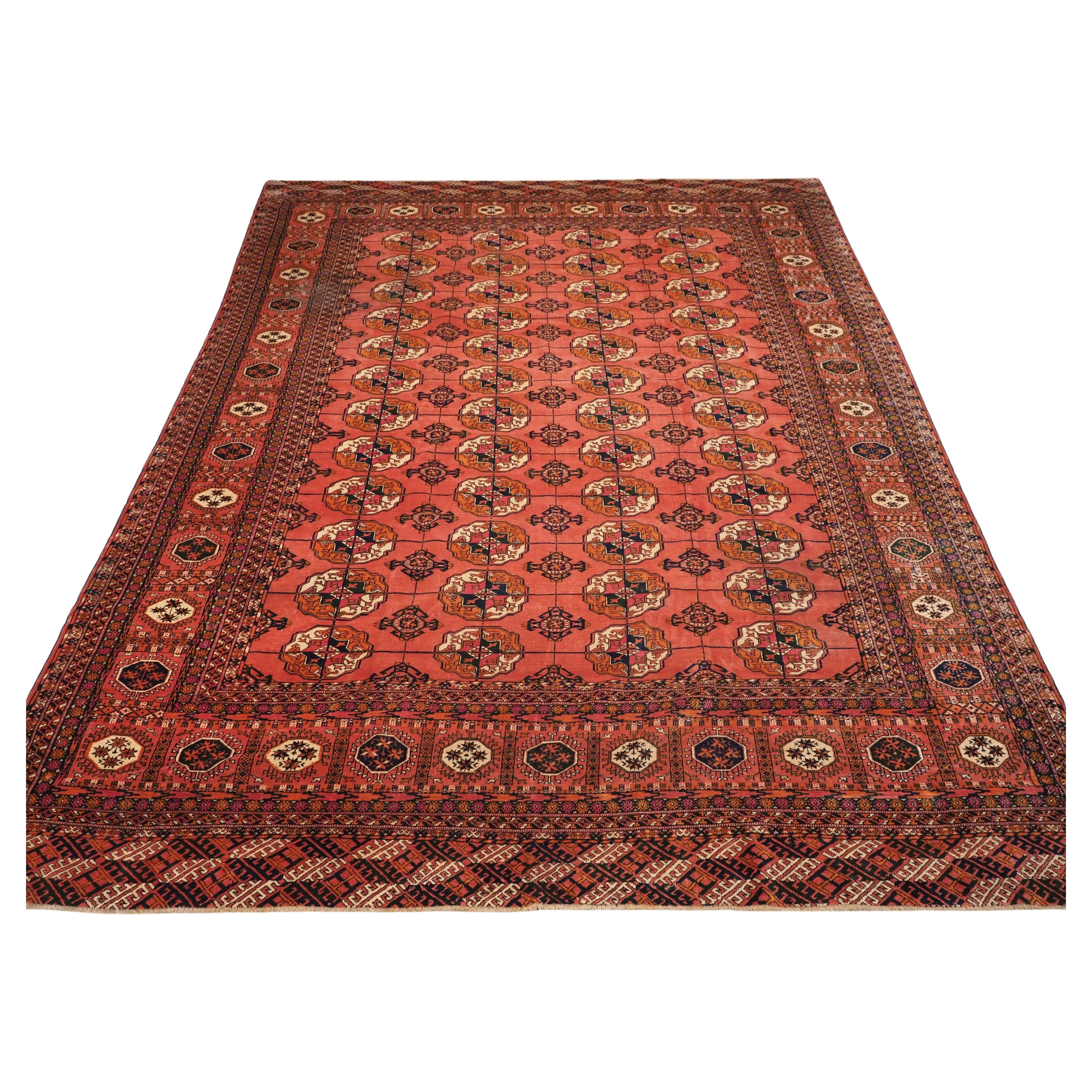 Tapis turc Tekke ancien avec 4 rangées de 12 Guls.  Circa 1900. en vente