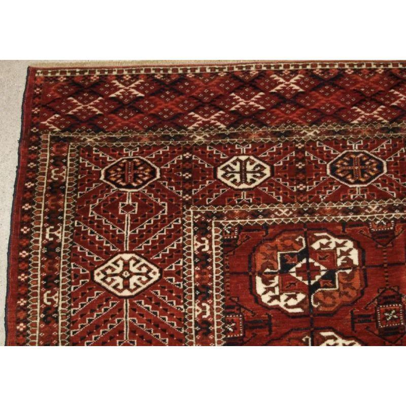 Antique Tekke Turkmen Main Carpet with 5 Rows of 12 Guls In Good Condition For Sale In Moreton-In-Marsh, GB