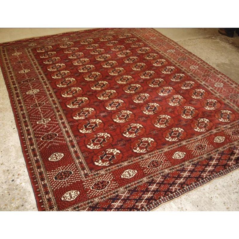 19th Century Antique Tekke Turkmen Main Carpet with 5 Rows of 12 Guls For Sale