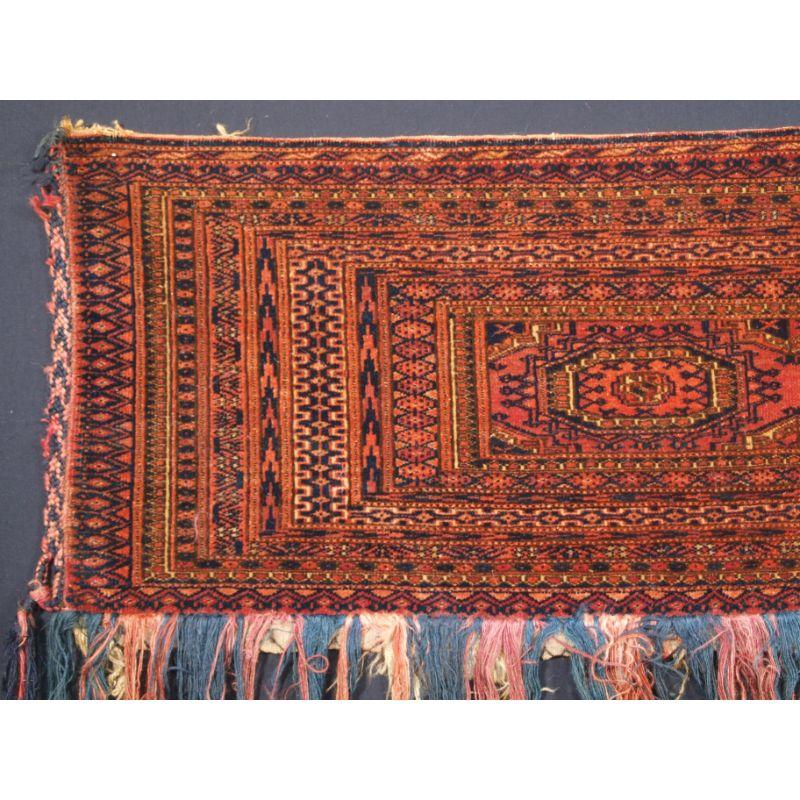 Antique Tekke Turkmen torba of very fine weave with turreted gul design.

A good Tekke torba with excellent colour and good wool. The torba has survived very well with most of the original long tassels still intact. The torba has three turreted