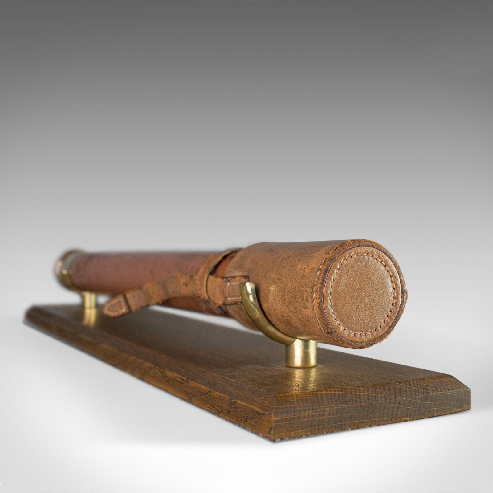 This is an antique telescope, a single draw refractor for terrestrial or astronomical use. An English, 'Officer of the Watch' telescope dating to the early 20th century.

Perfect for bird watching, landscape appreciation, wildlife, or maritime