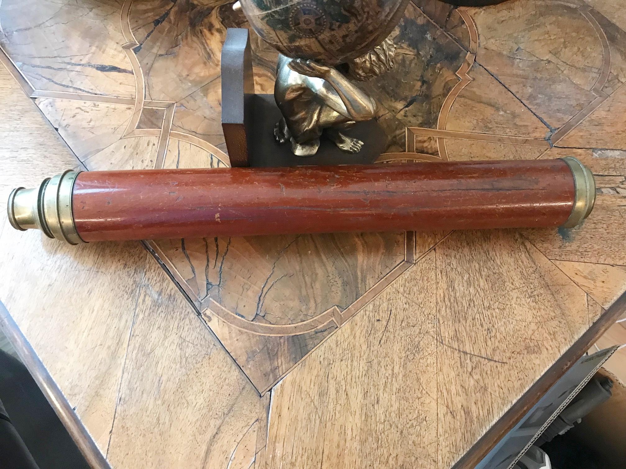 Antique telescope made of brass and wood, circa 1820

A brass tube, which can be pushed into a wooden tube, lenses available, but it seems that the connector between the inner and outer tube is missing, because the inner tube can be completely
